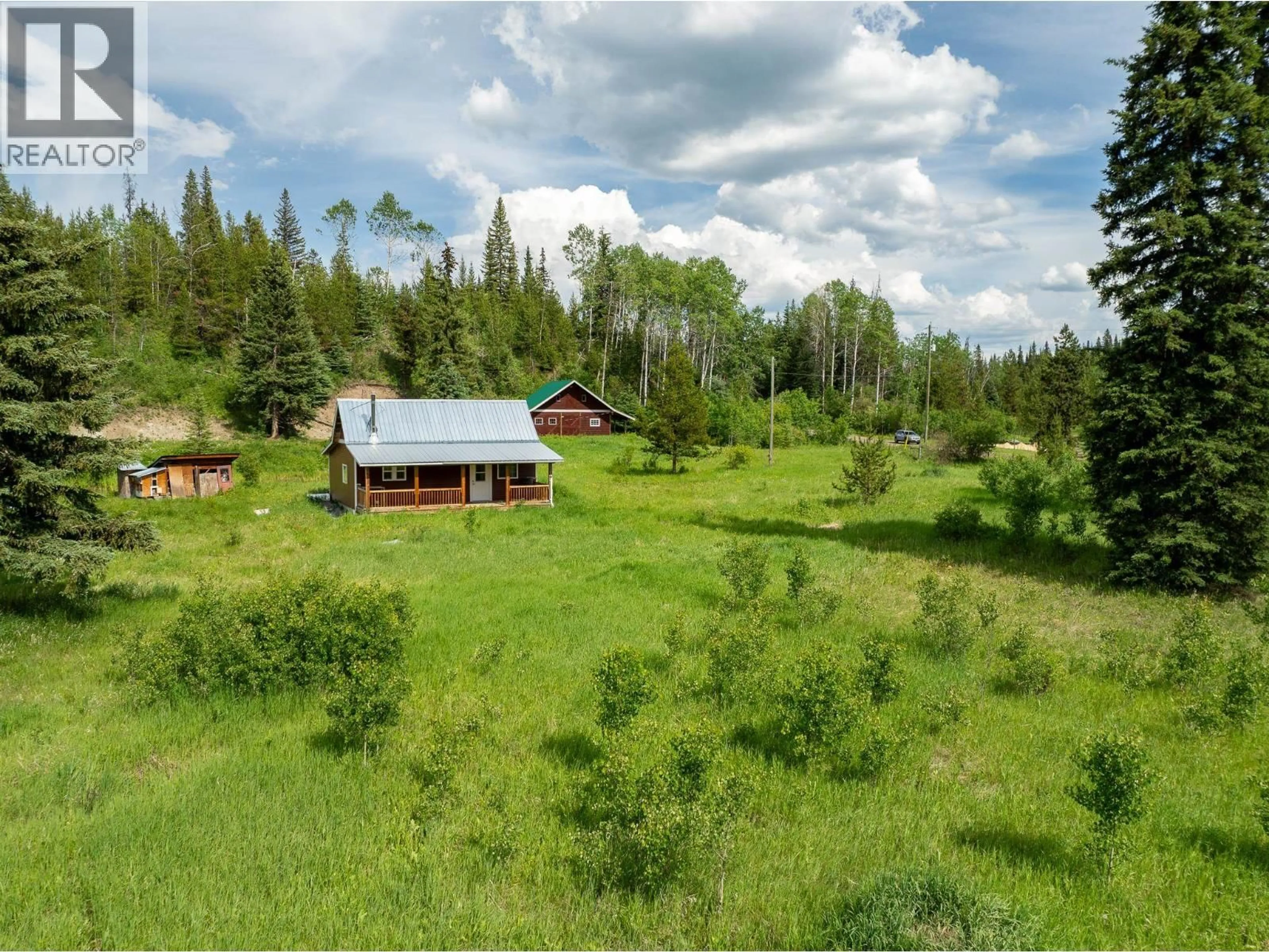 A pic from outside/outdoor area/front of a property/back of a property/a pic from drone, forest/trees view for 6665 JUDSON ROAD, Bridge Lake British Columbia V0K1X3