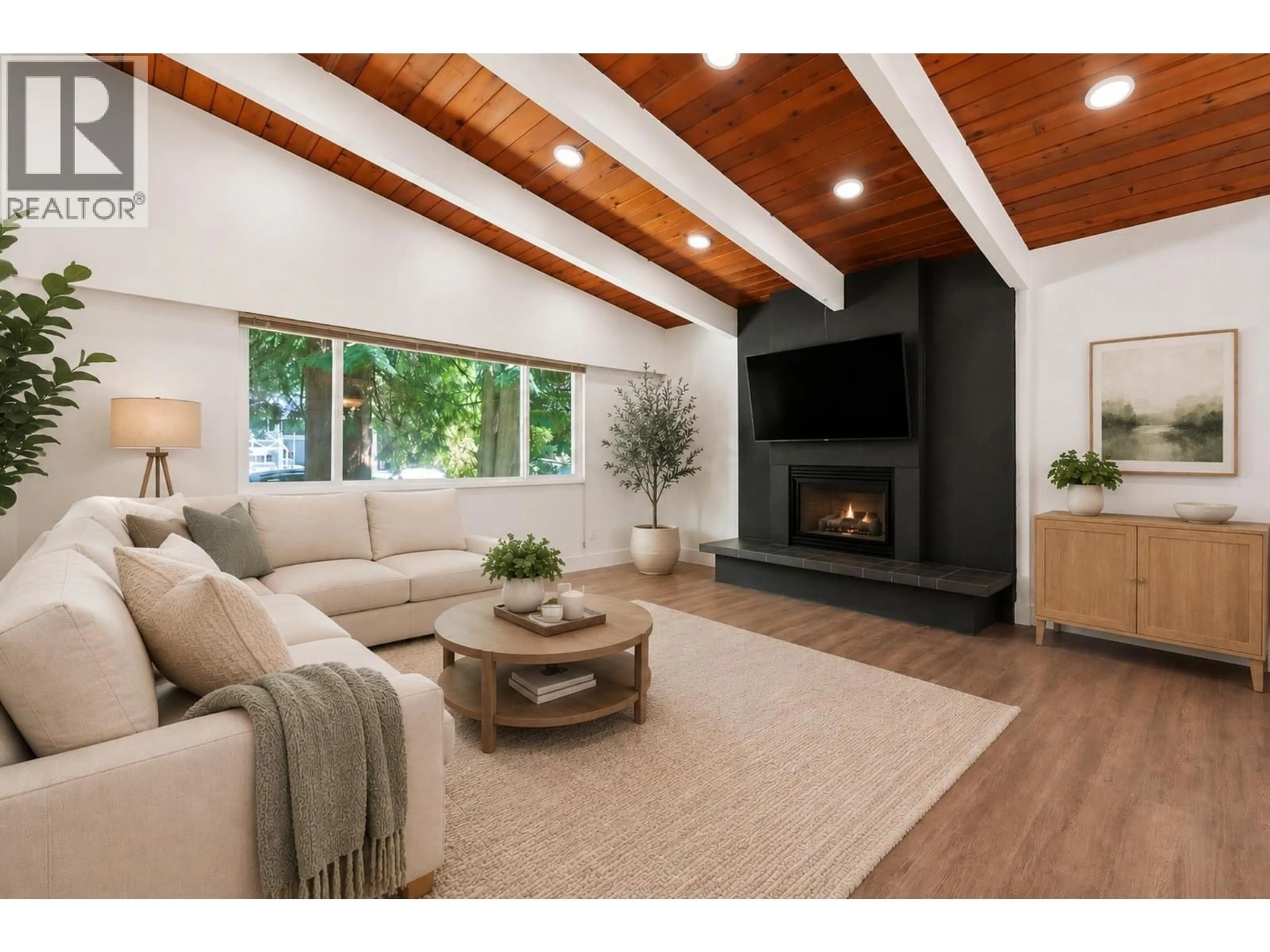 Living room with furniture, wood/laminate floor for 1707 DEMPSEY ROAD, North Vancouver British Columbia V7K1T2