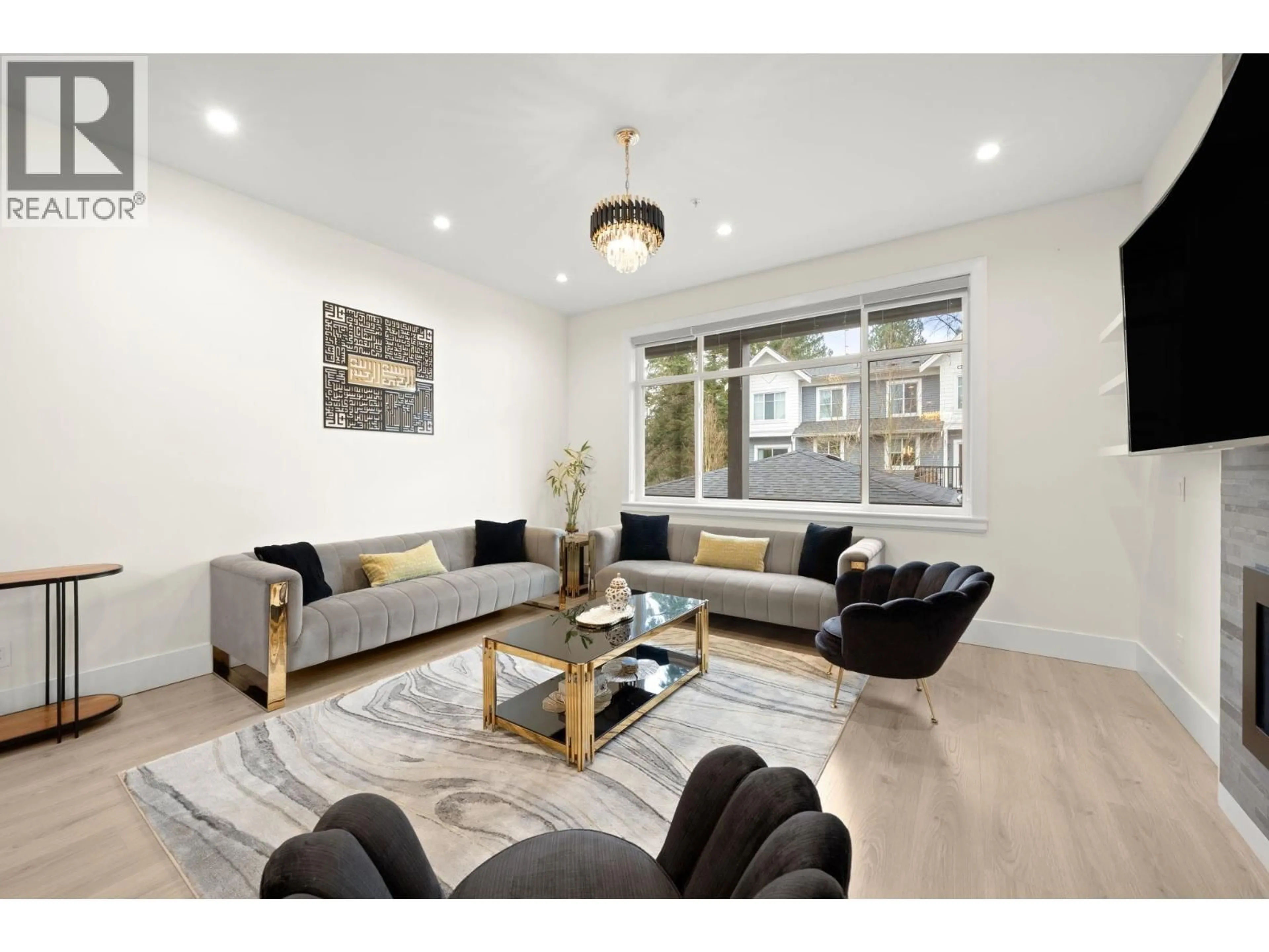 Living room with furniture, wood/laminate floor for 11042 240 STREET, Maple Ridge British Columbia V2W1H6