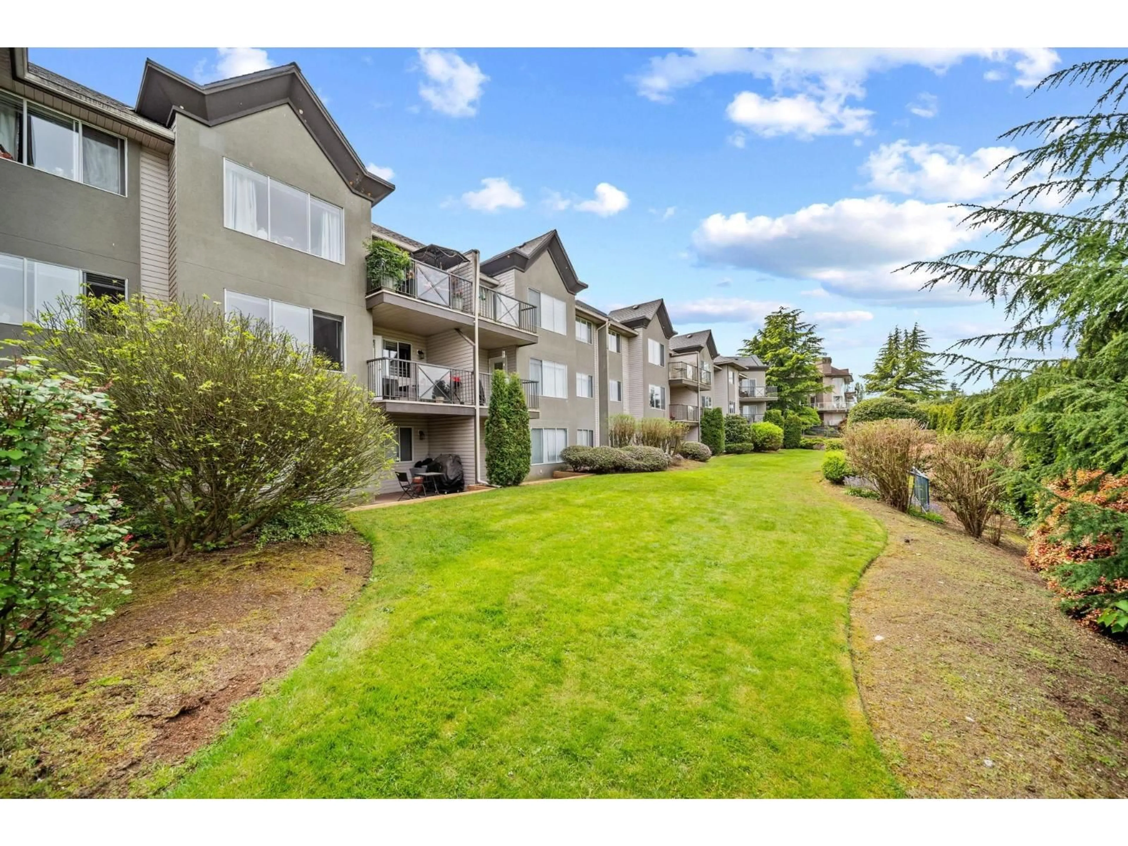 A pic from outside/outdoor area/front of a property/back of a property/a pic from drone, water/lake/river/ocean view for 219 - 32725 GEORGE FERGUSON WAY, Abbotsford British Columbia V2T5M5