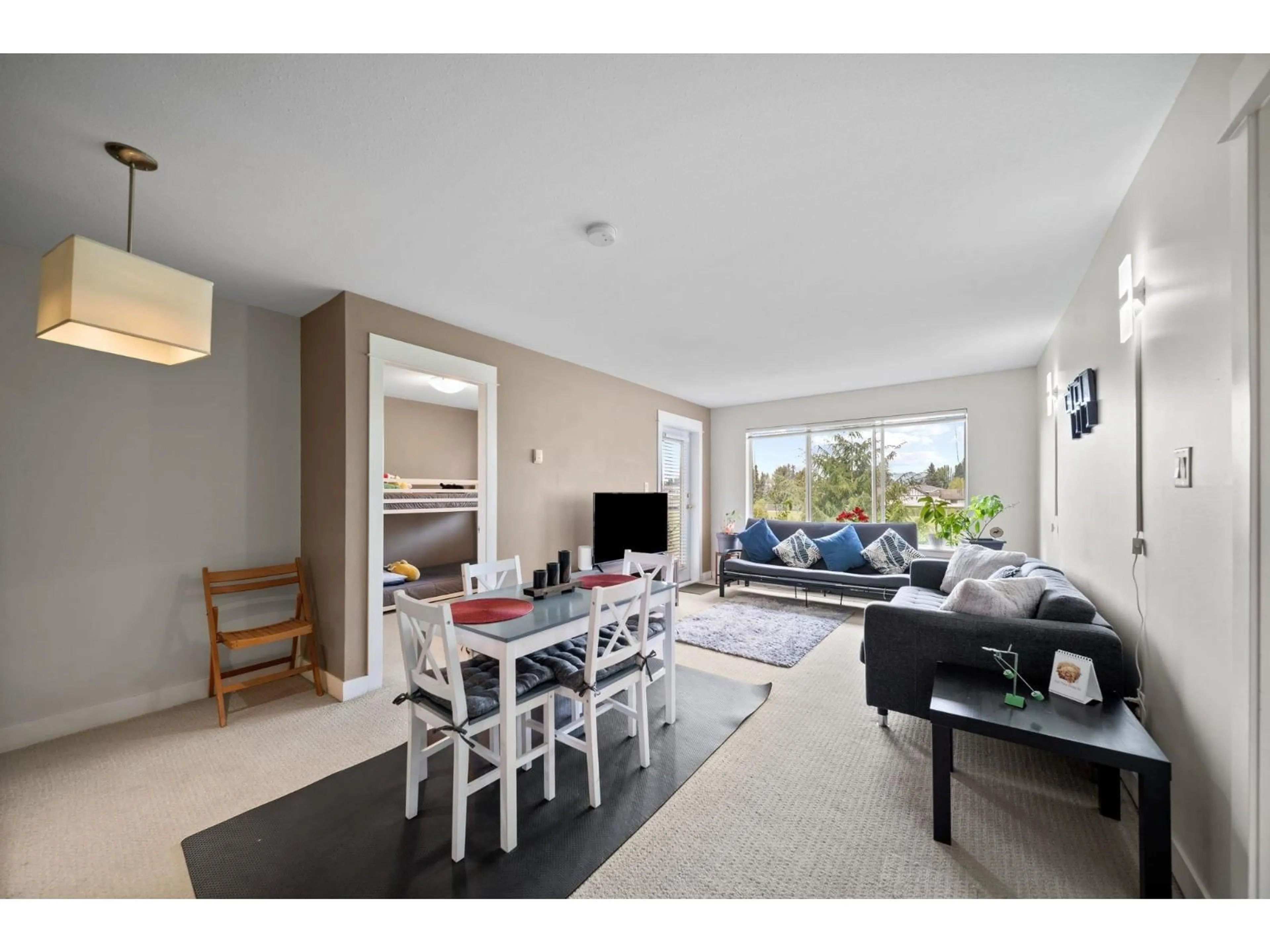 Living room with furniture, unknown for 219 - 32725 GEORGE FERGUSON WAY, Abbotsford British Columbia V2T5M5