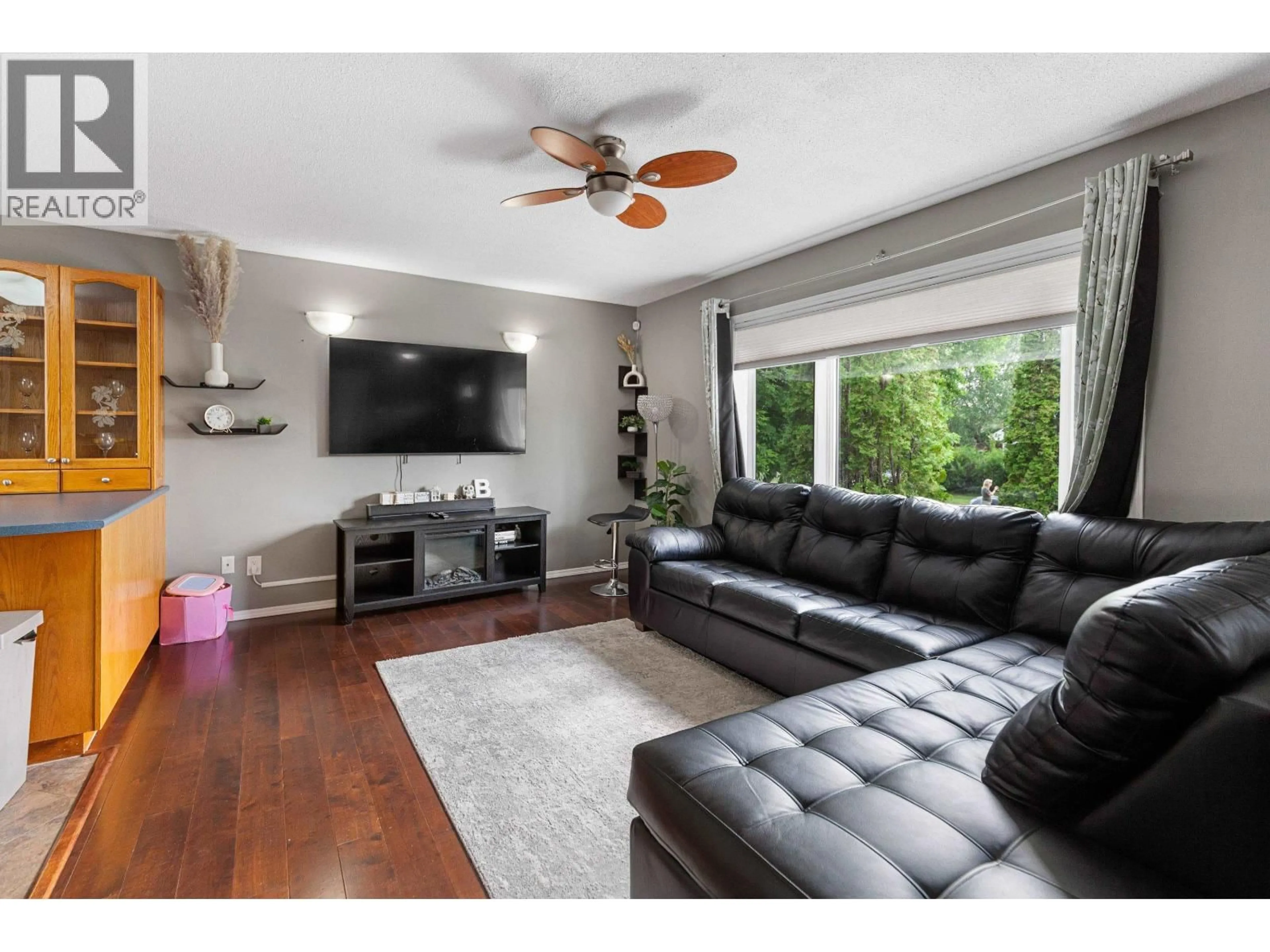 Living room with furniture, wood/laminate floor for 554 BURDEN STREET, Prince George British Columbia V2M2H5
