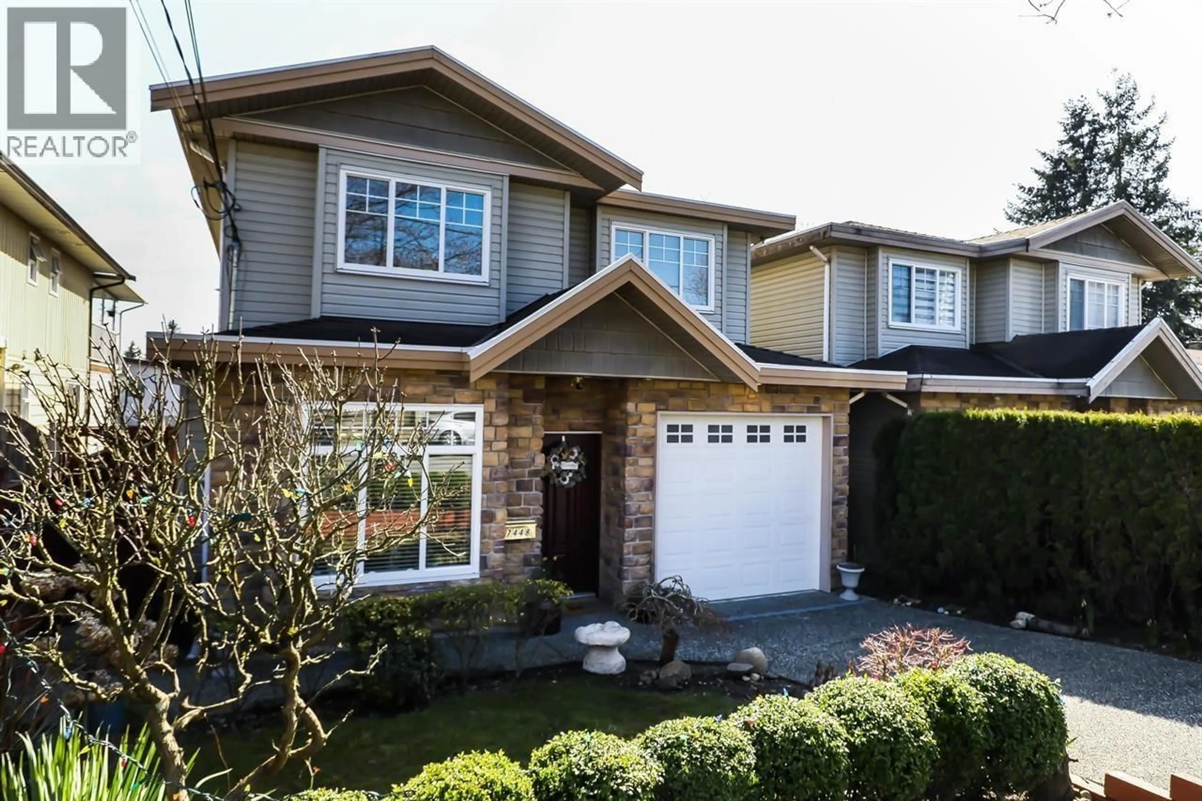 Home with vinyl exterior material, street for 7448 17TH AVENUE, Burnaby British Columbia V3N1L4