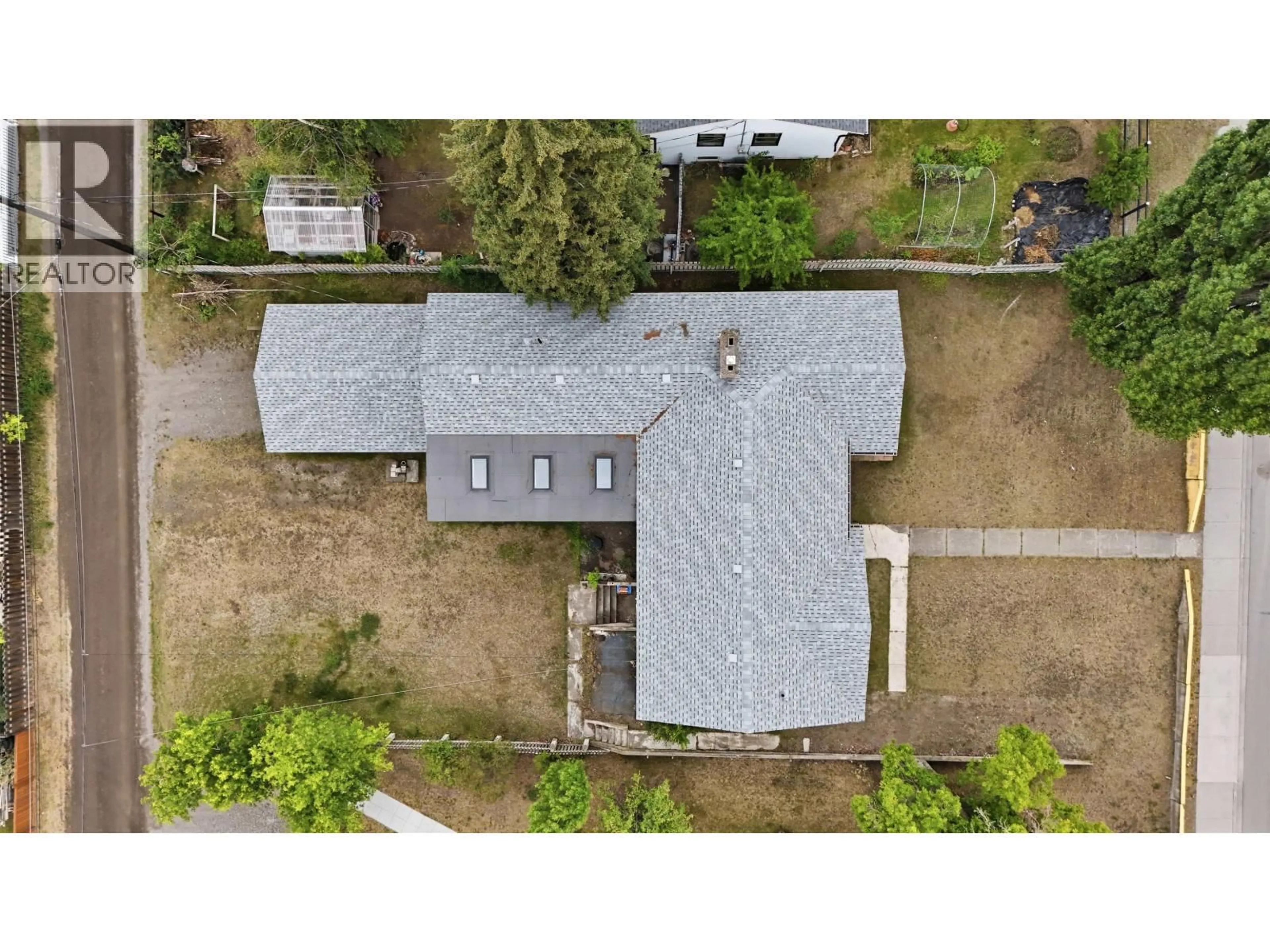 A pic from outside/outdoor area/front of a property/back of a property/a pic from drone, unknown for 239 FIFTH AVENUE, Williams Lake British Columbia V2G2E9