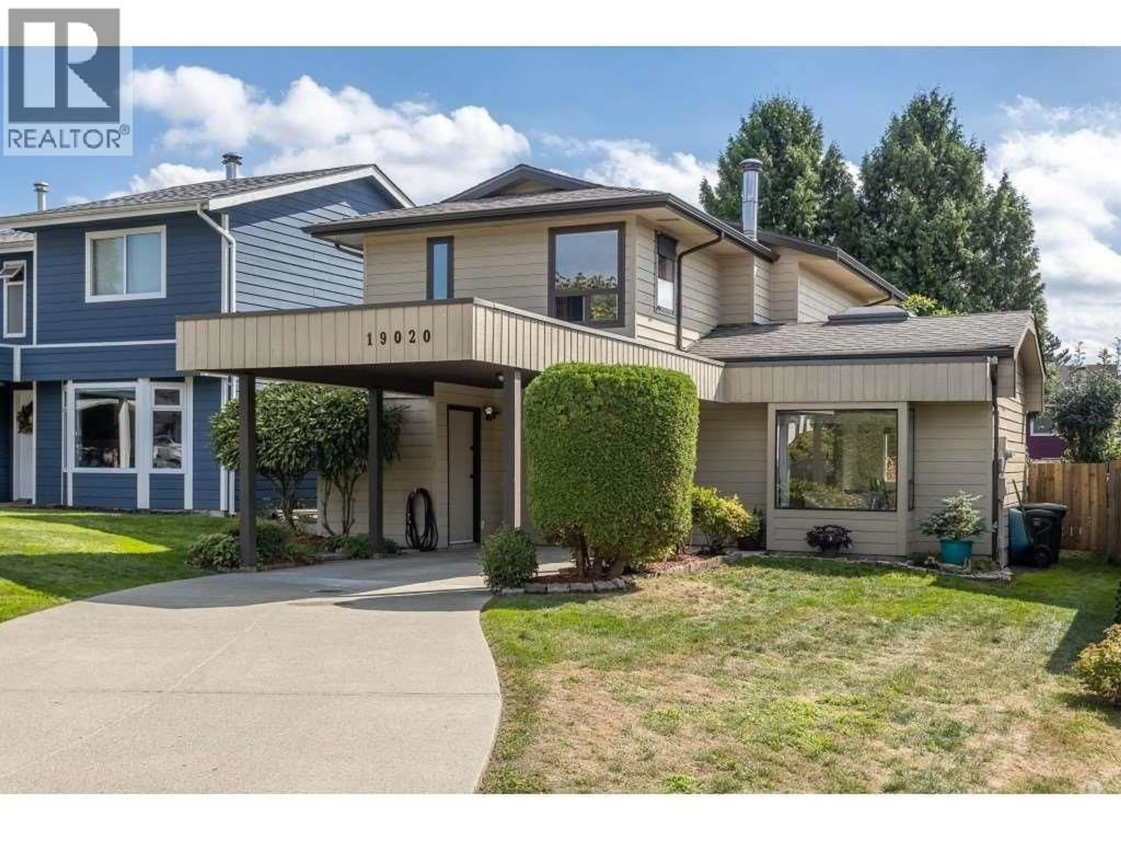 Home with vinyl exterior material, street for 19020 MITCHELL ROAD, Pitt Meadows British Columbia V3Y1X9