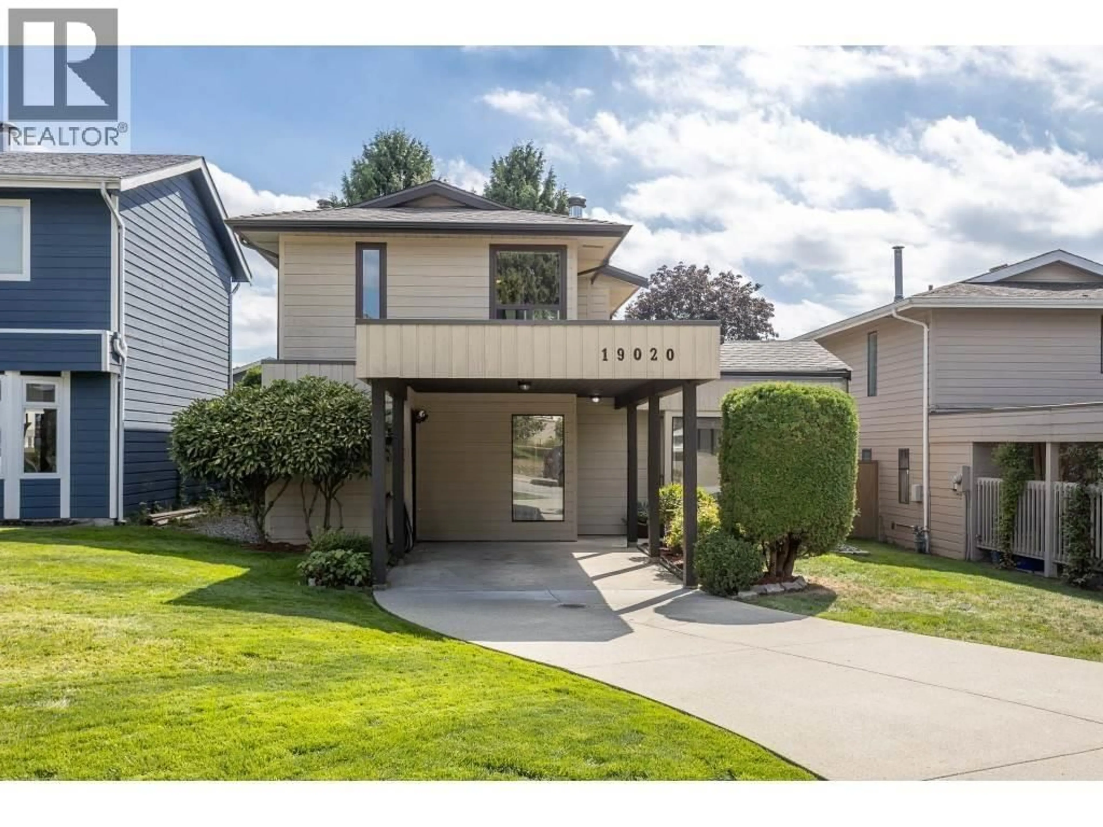 Home with vinyl exterior material, street for 19020 MITCHELL ROAD, Pitt Meadows British Columbia V3Y1X9