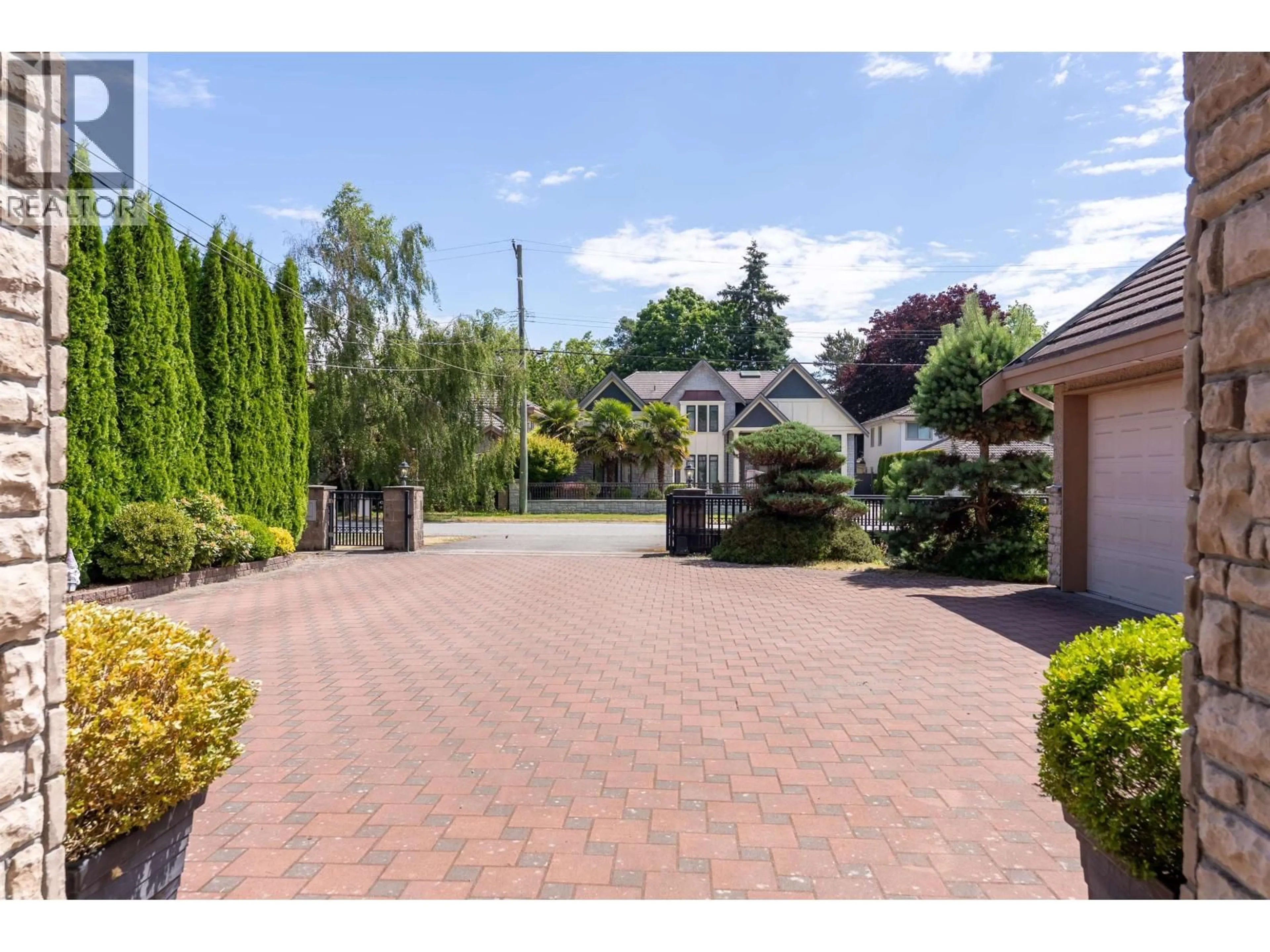 A pic from outside/outdoor area/front of a property/back of a property/a pic from drone, street for 8811 MINLER ROAD, Richmond British Columbia V7C3V1