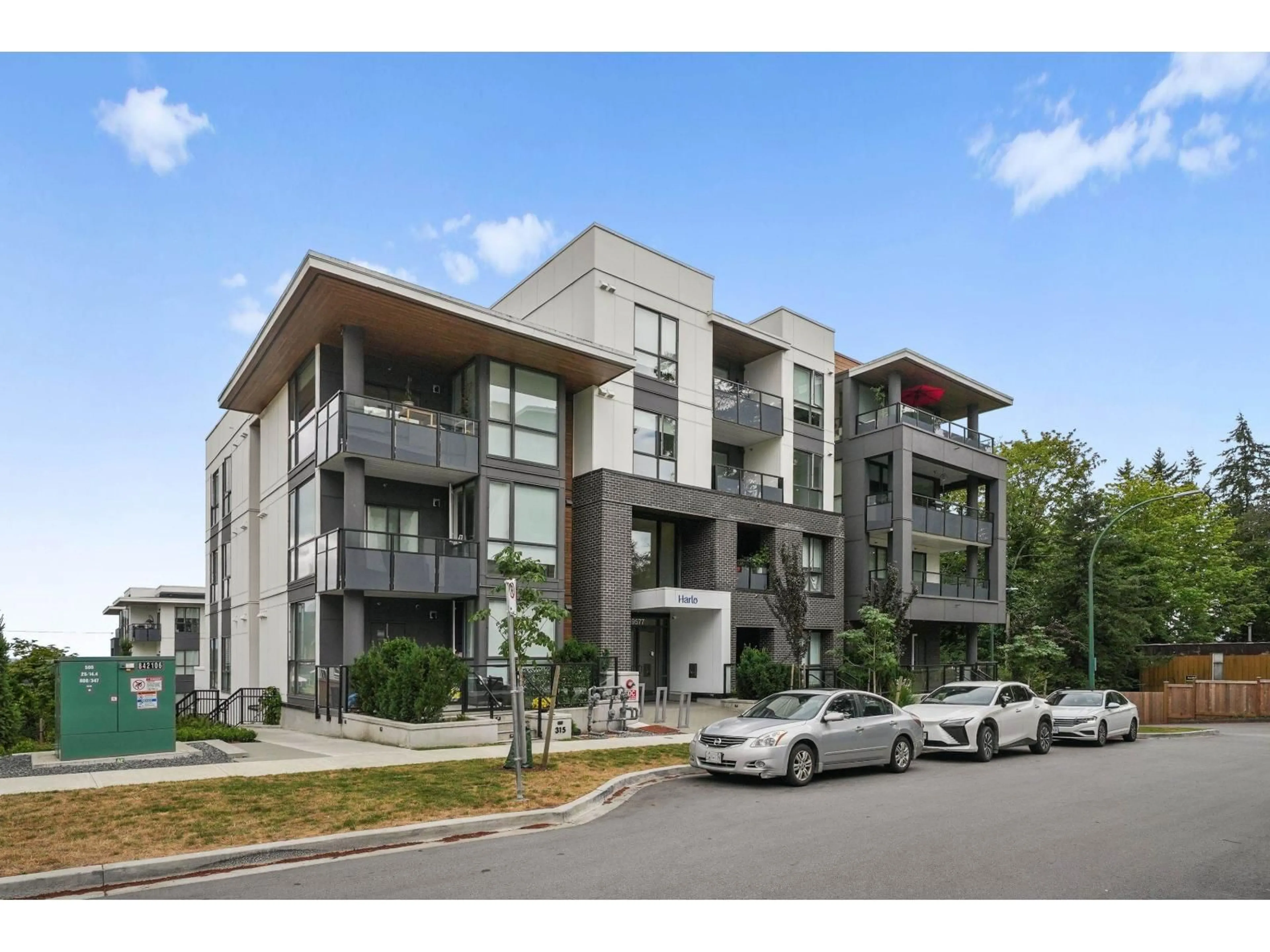 A pic from outside/outdoor area/front of a property/back of a property/a pic from drone, street for 209 - 19577 65B STREET, Surrey British Columbia V4N6Y3