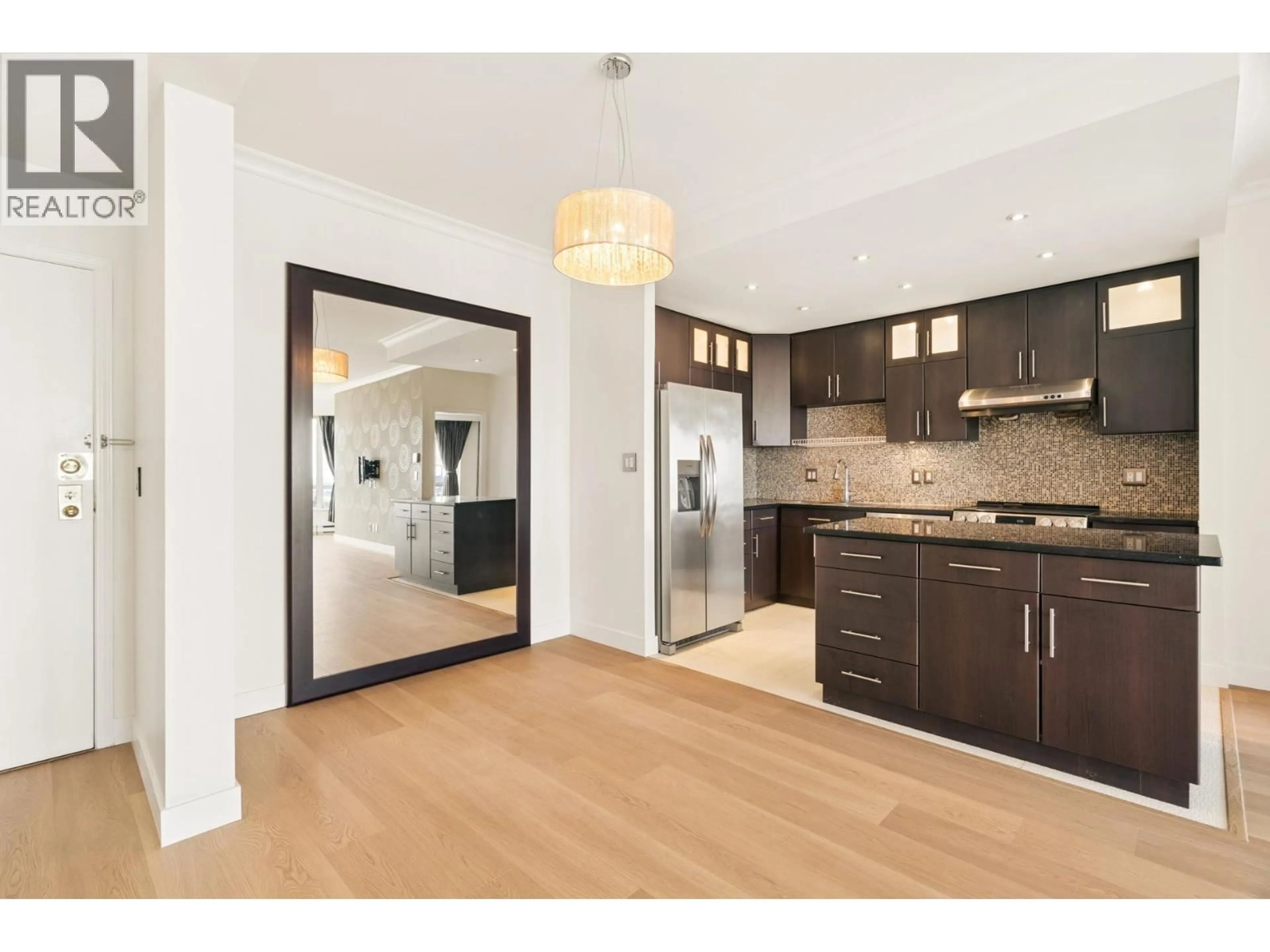 Open concept kitchen, wood/laminate floor for 2205 - 6220 MCKAY AVENUE, Burnaby British Columbia V5H4M8