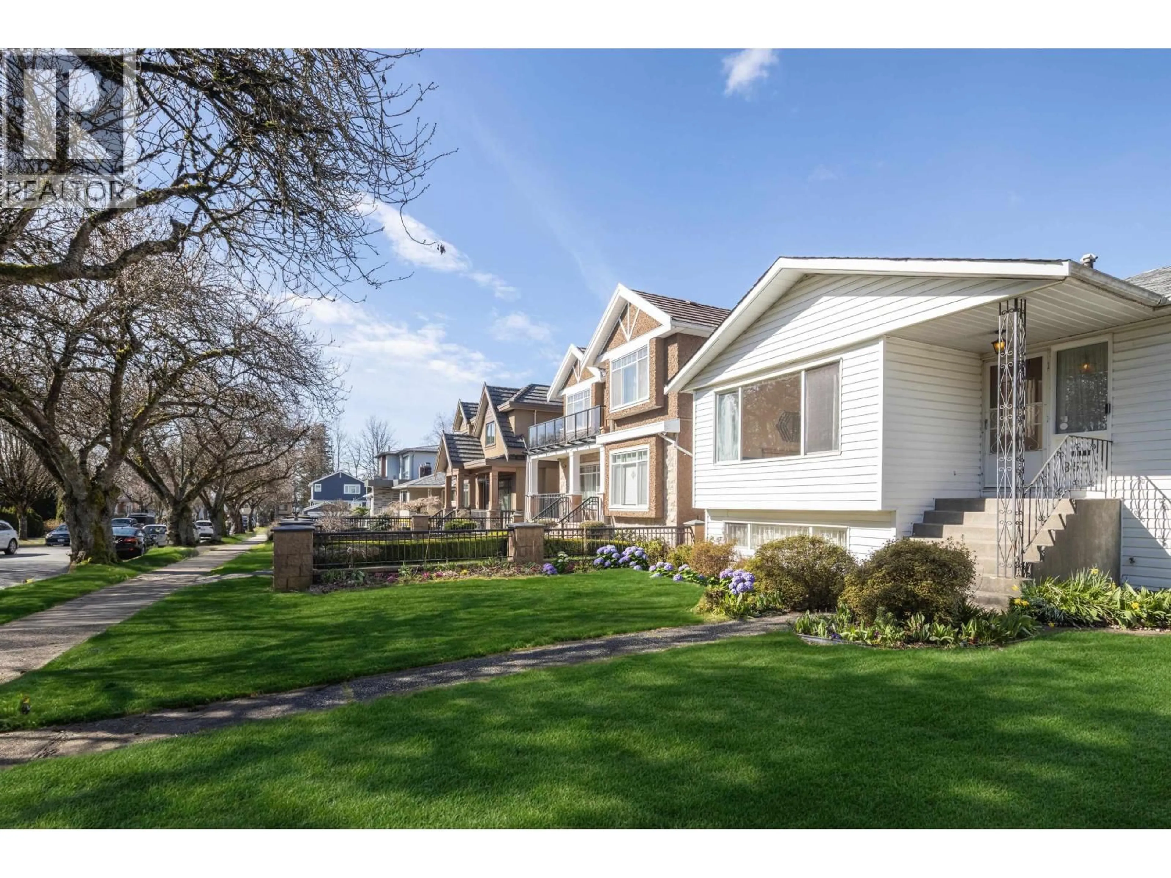 A pic from outside/outdoor area/front of a property/back of a property/a pic from drone, street for 3571 46TH AVENUE, Vancouver British Columbia V5S1B7