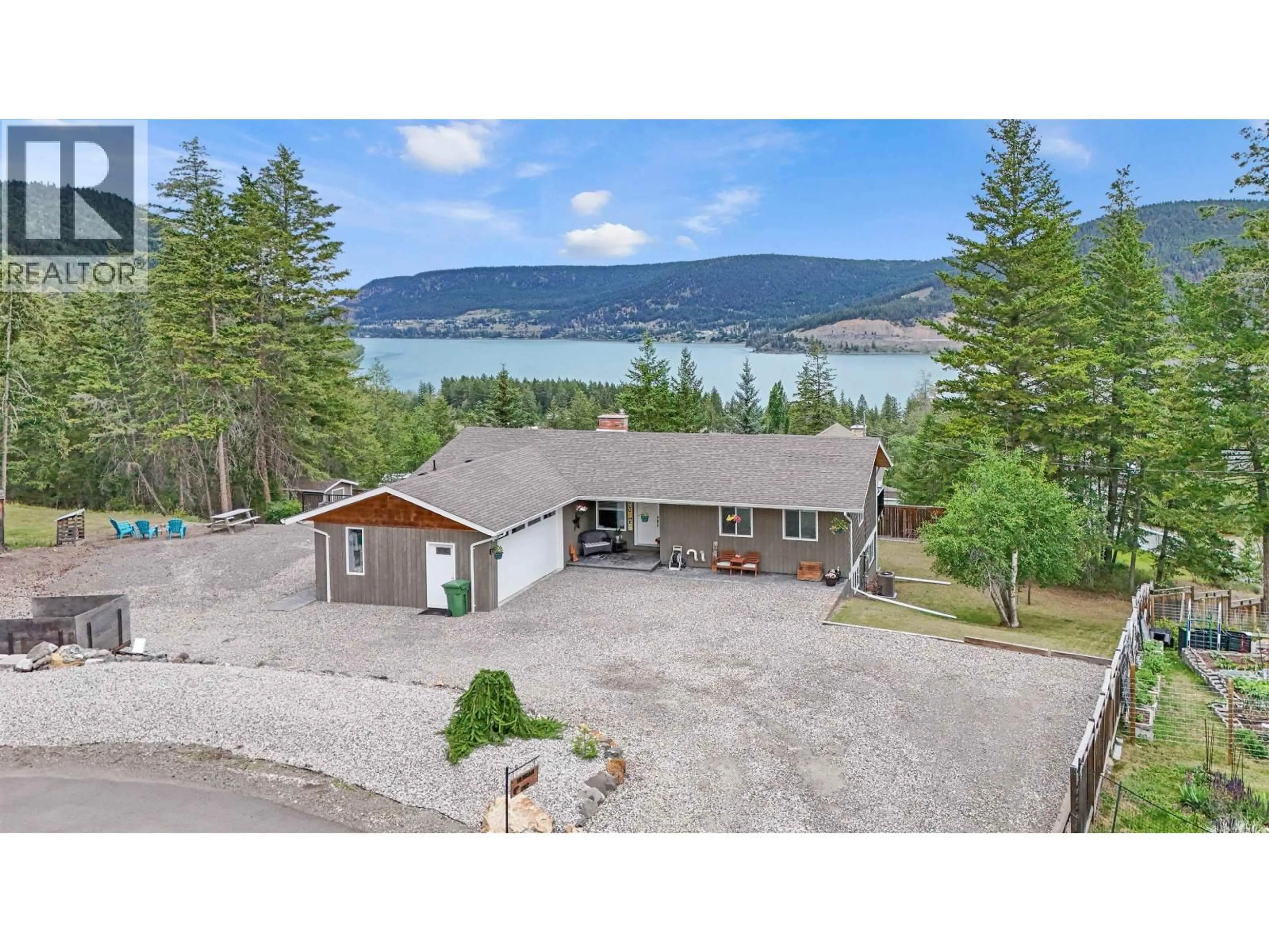 A pic from outside/outdoor area/front of a property/back of a property/a pic from drone, water/lake/river/ocean view for 2112 AQUA VIEW PLACE, Williams Lake British Columbia V2G5G2