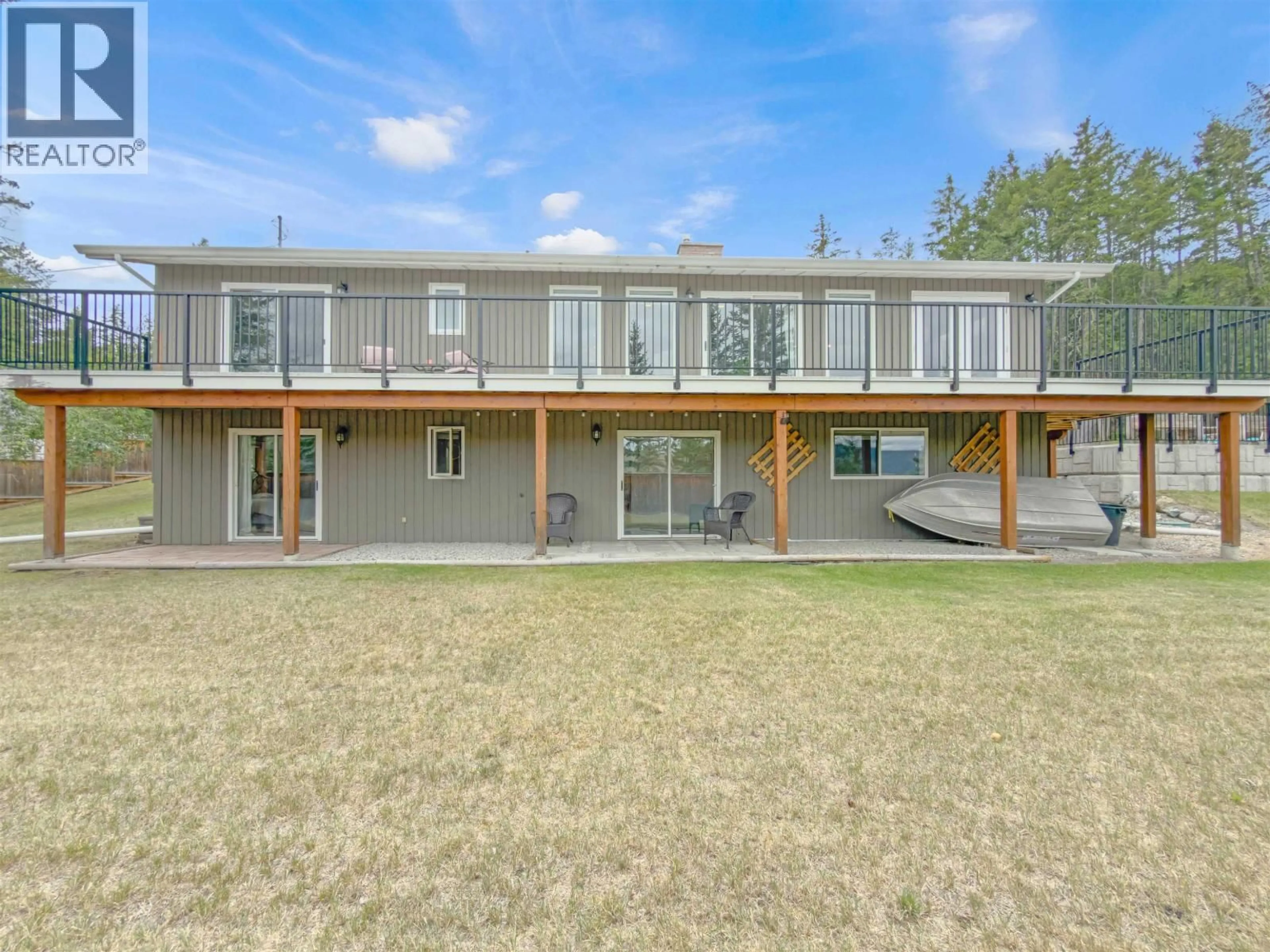 A pic from outside/outdoor area/front of a property/back of a property/a pic from drone, water/lake/river/ocean view for 2112 AQUA VIEW PLACE, Williams Lake British Columbia V2G5G2