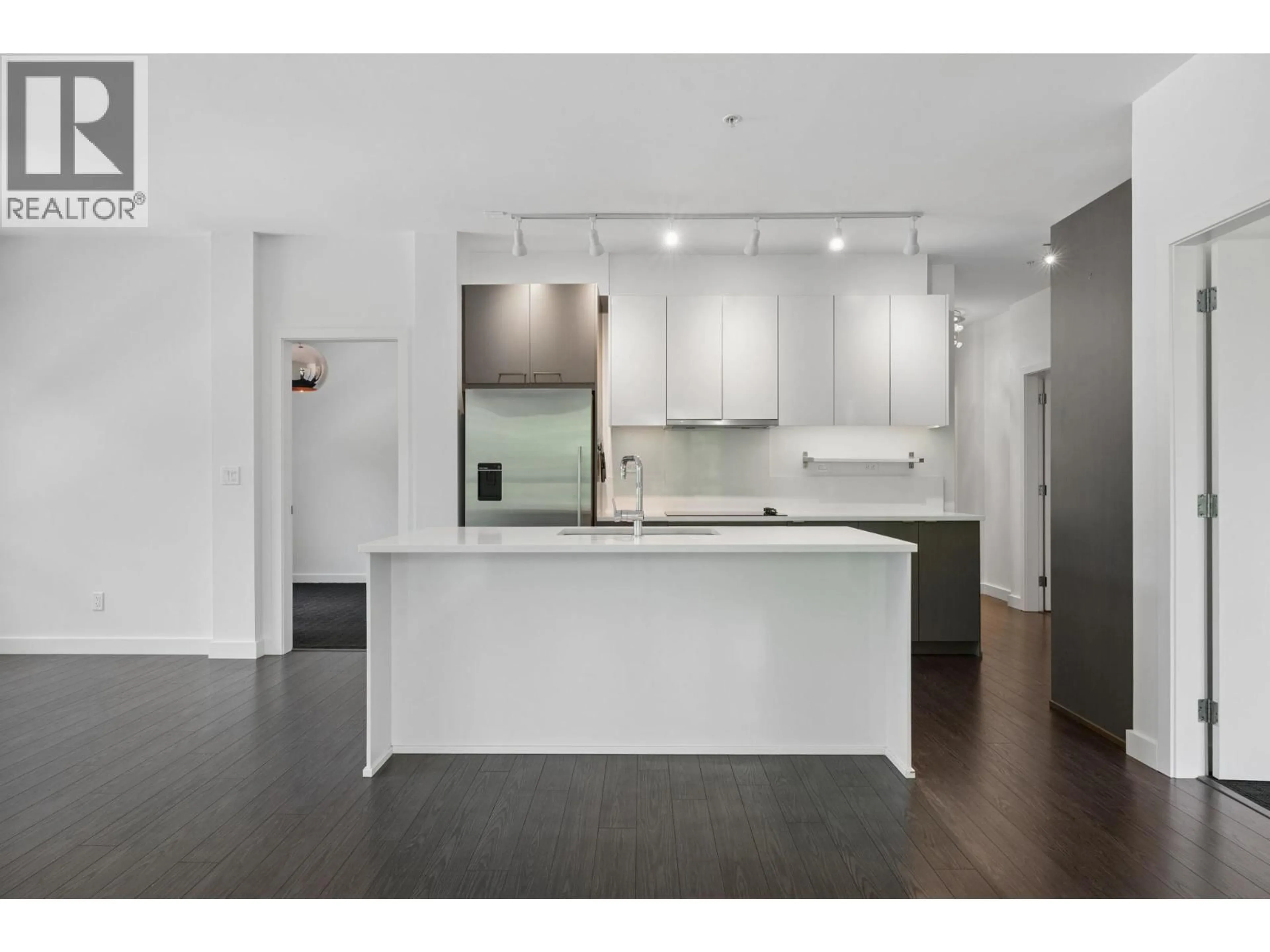 Open concept kitchen, unknown for 204 - 1621 HAMILTON AVENUE, North Vancouver British Columbia V7P0B6