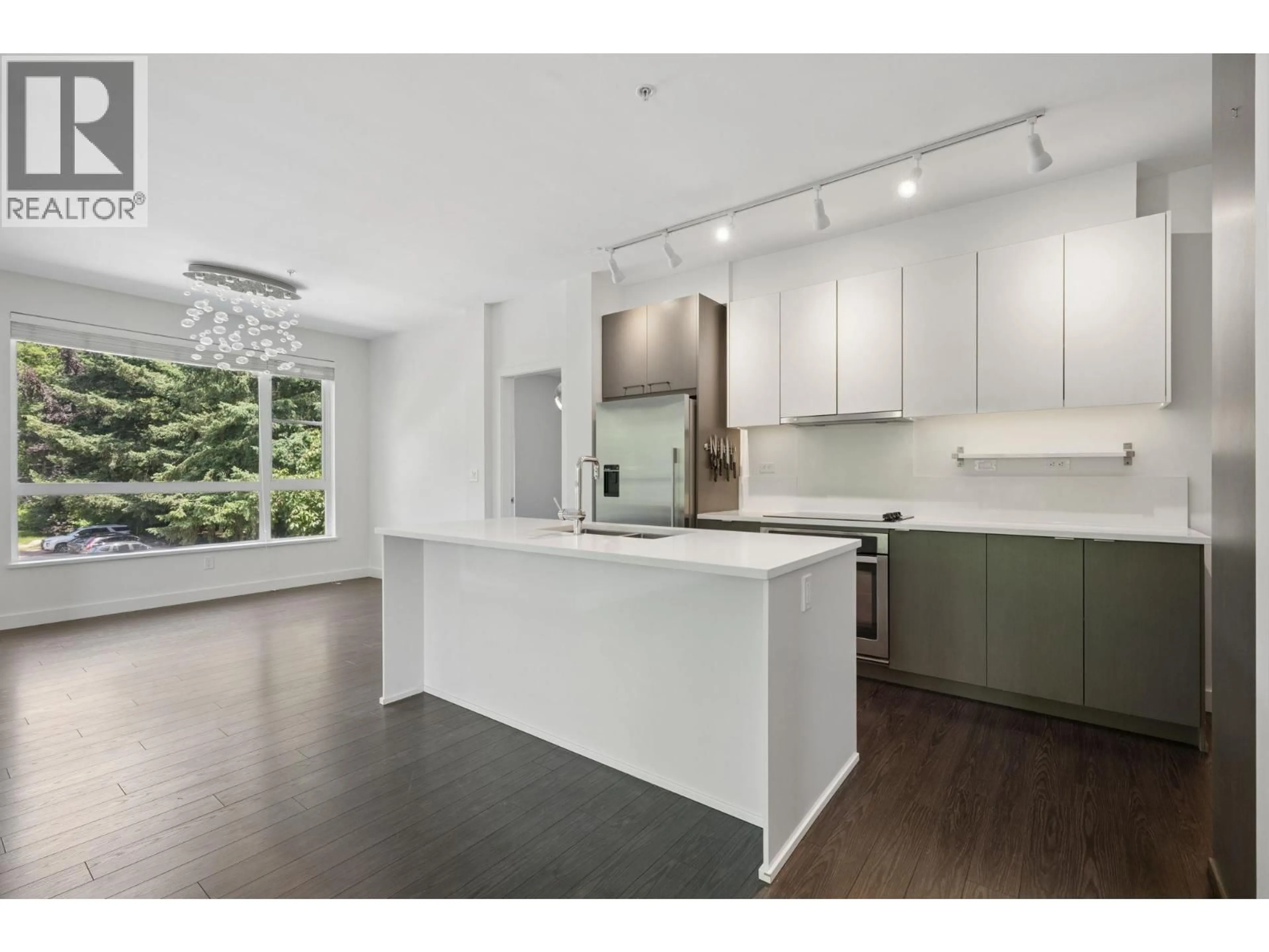 Open concept kitchen, unknown for 204 - 1621 HAMILTON AVENUE, North Vancouver British Columbia V7P0B6