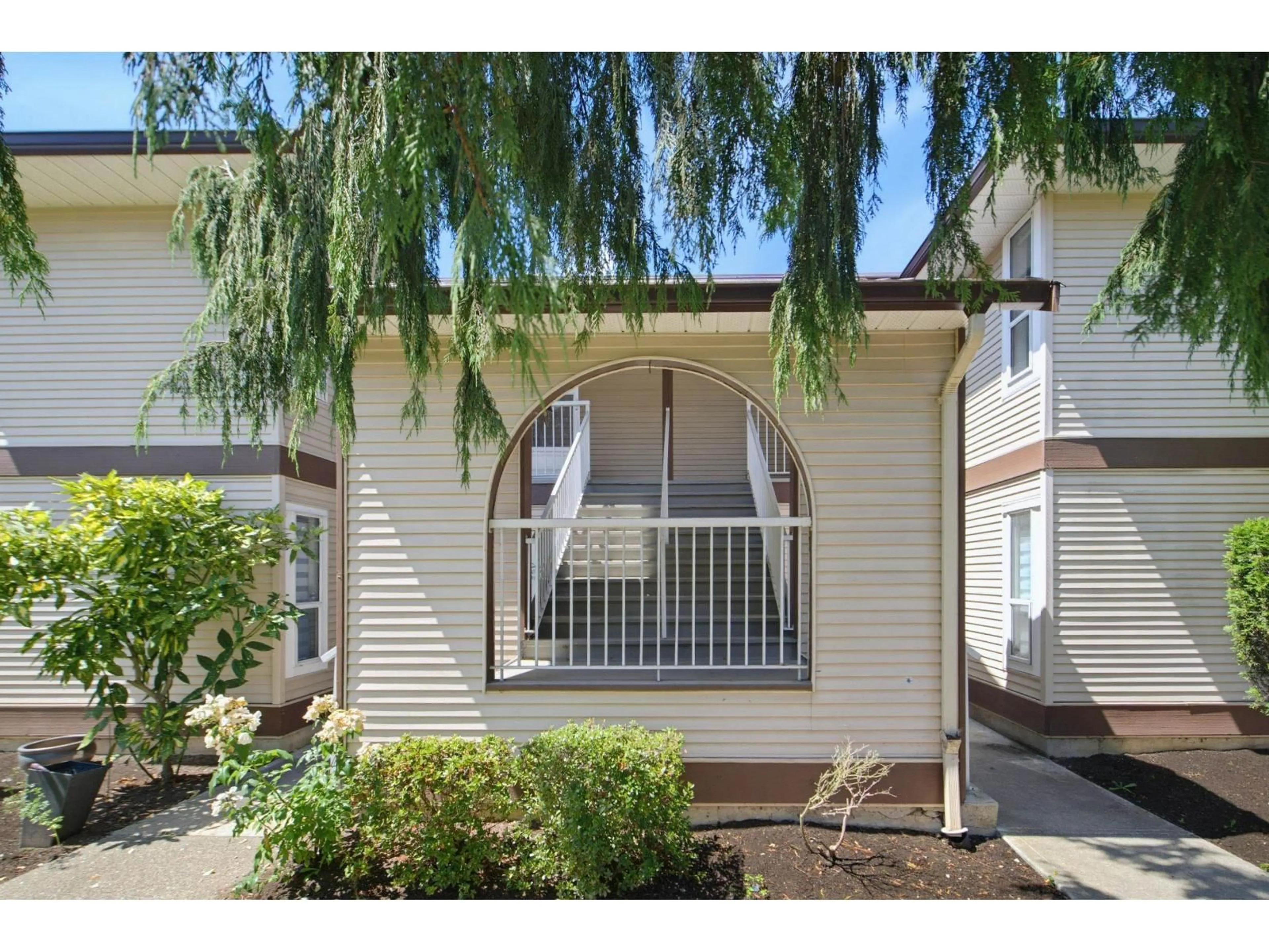 Home with vinyl exterior material, street for 1107 - 1750 MCKENZIE ROAD, Abbotsford British Columbia V2S3Z3