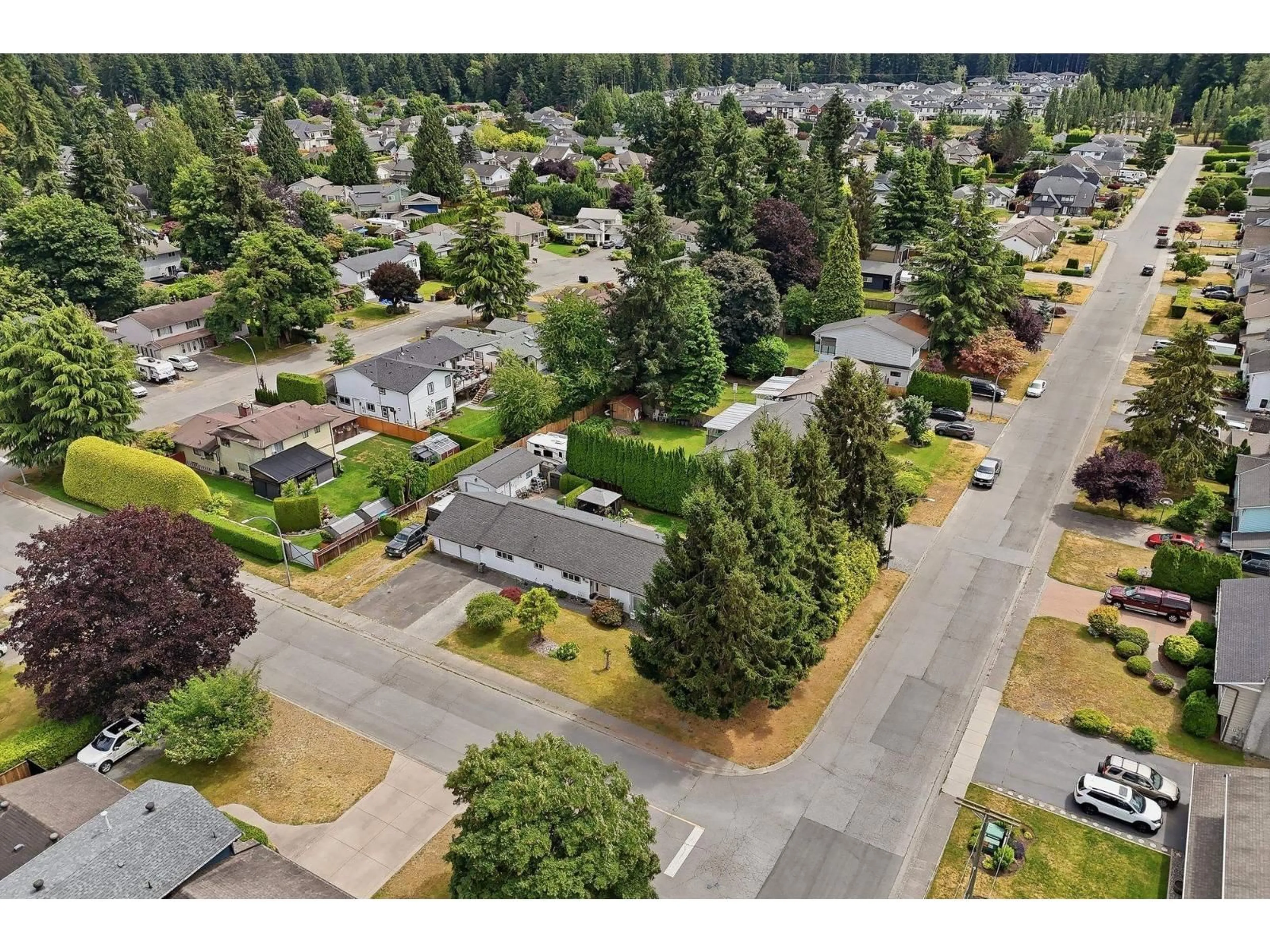 A pic from outside/outdoor area/front of a property/back of a property/a pic from drone, street for 19660 35A AVENUE, Langley British Columbia V3A7C9
