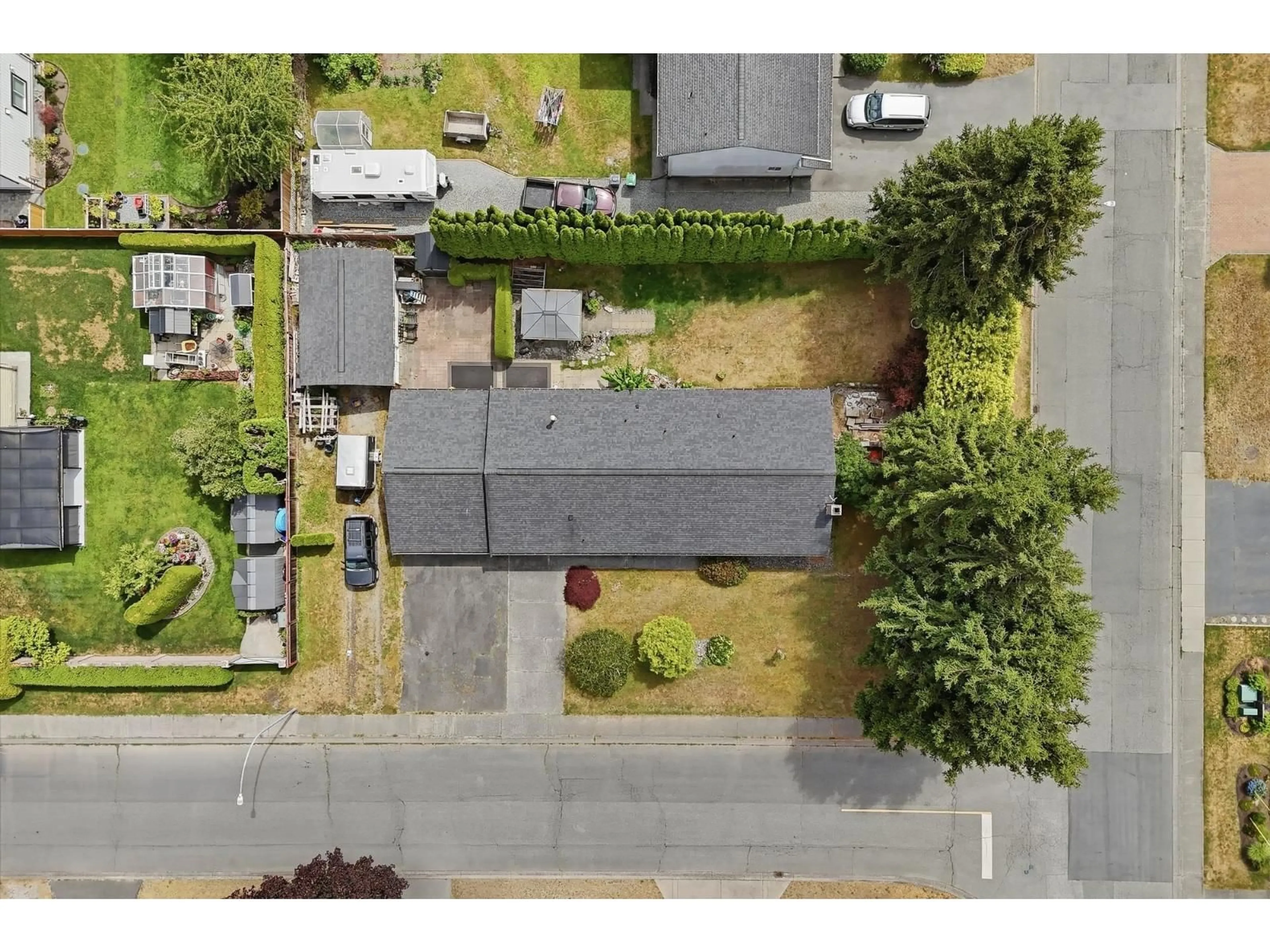 A pic from outside/outdoor area/front of a property/back of a property/a pic from drone, street for 19660 35A AVENUE, Langley British Columbia V3A7C9