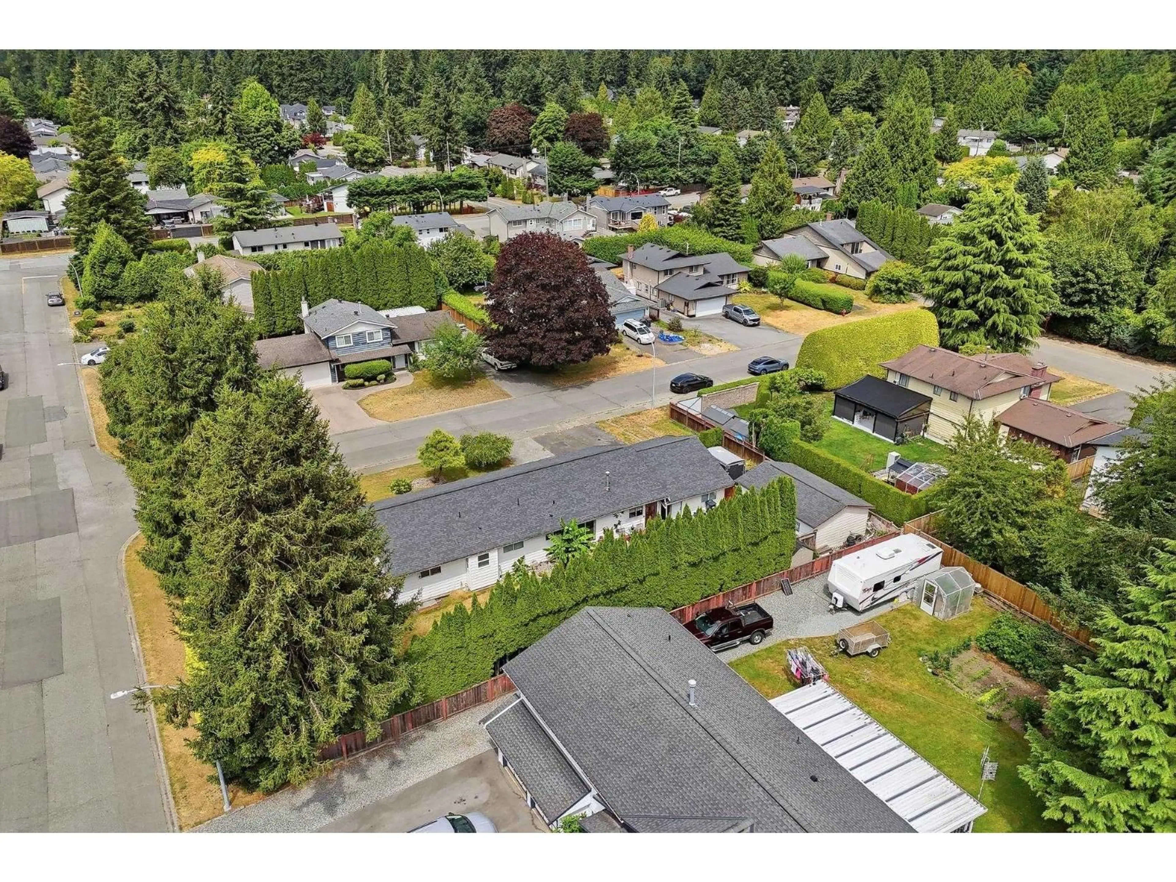 A pic from outside/outdoor area/front of a property/back of a property/a pic from drone, street for 19660 35A AVENUE, Langley British Columbia V3A7C9
