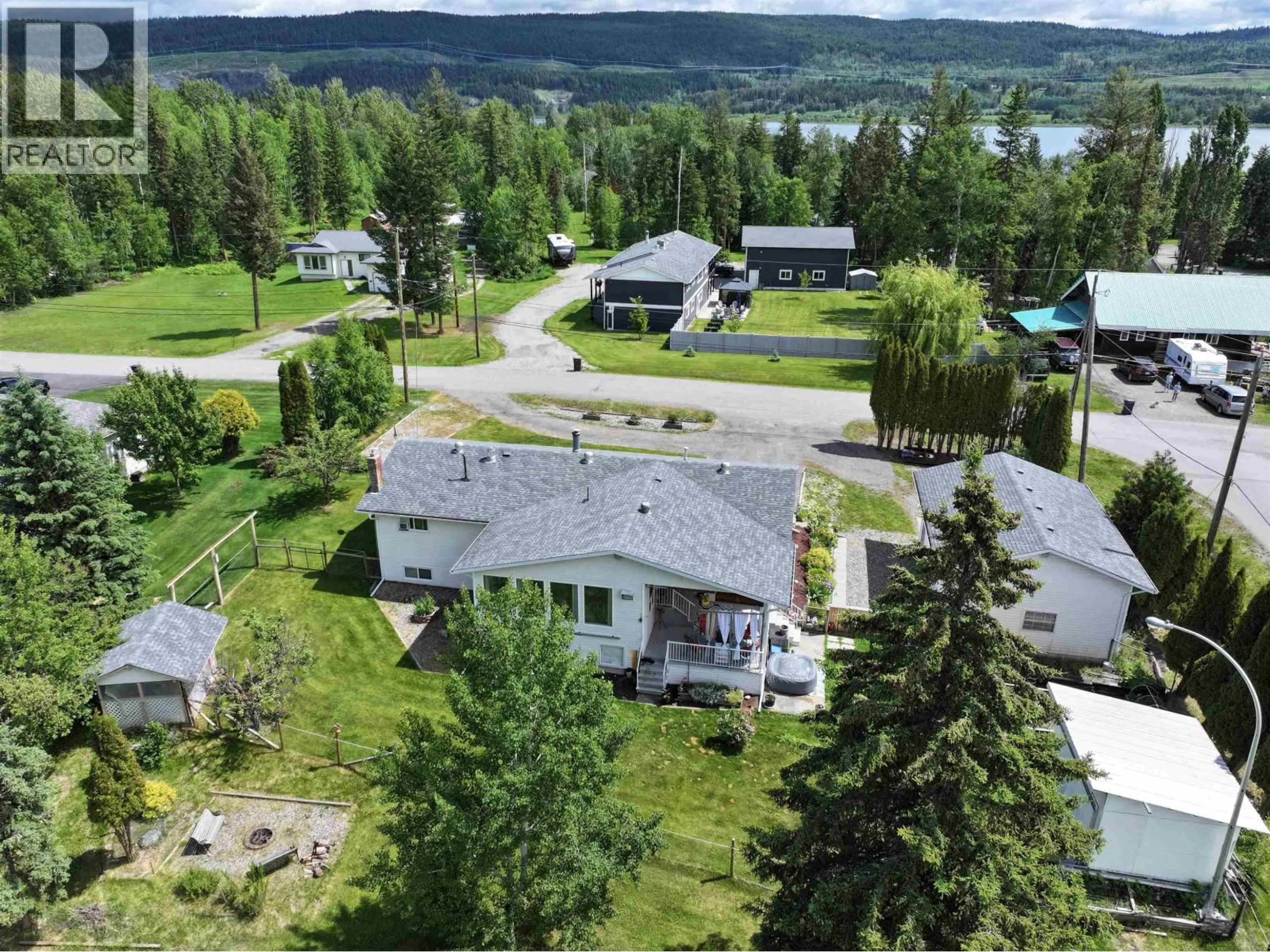 A pic from outside/outdoor area/front of a property/back of a property/a pic from drone, water/lake/river/ocean view for 1541 BEACH CRESCENT, Quesnel British Columbia V2J4J5