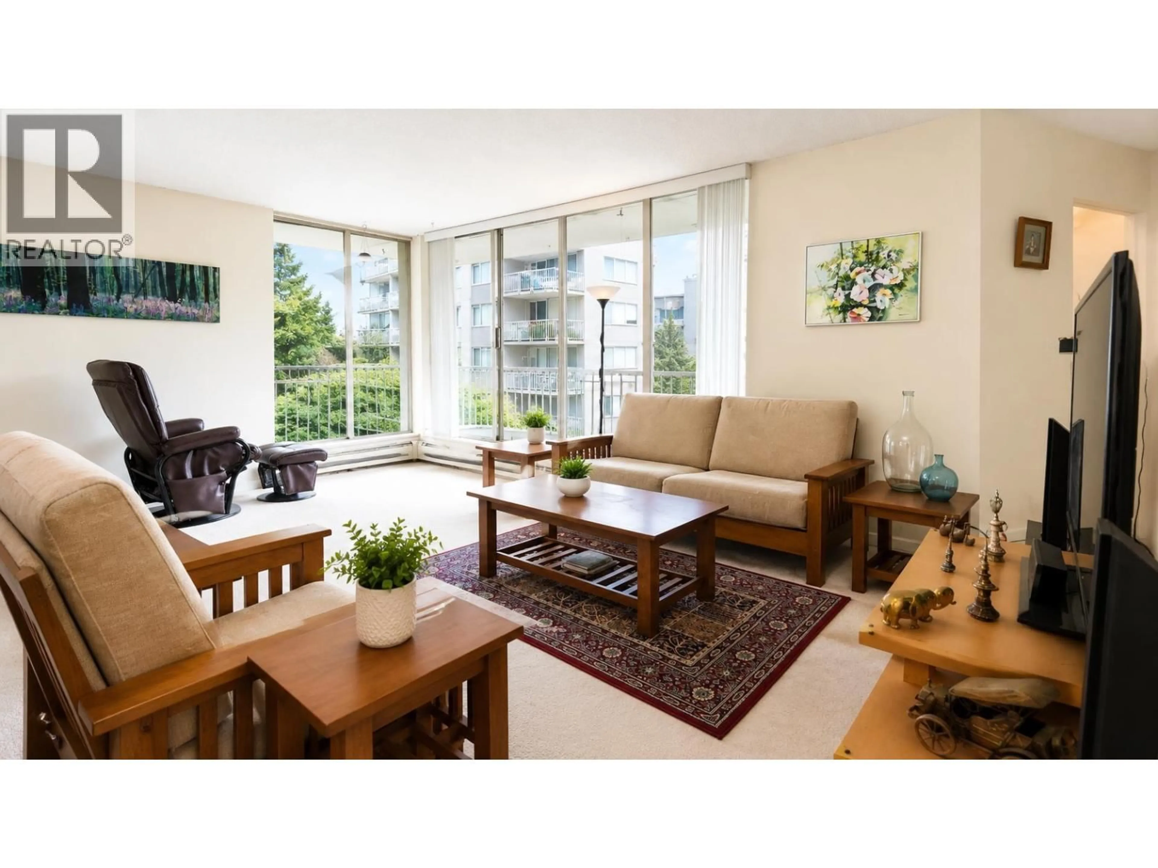 Living room with furniture, wood/laminate floor for 503 - 2020 FULLERTON AVENUE, North Vancouver British Columbia V7P3G3