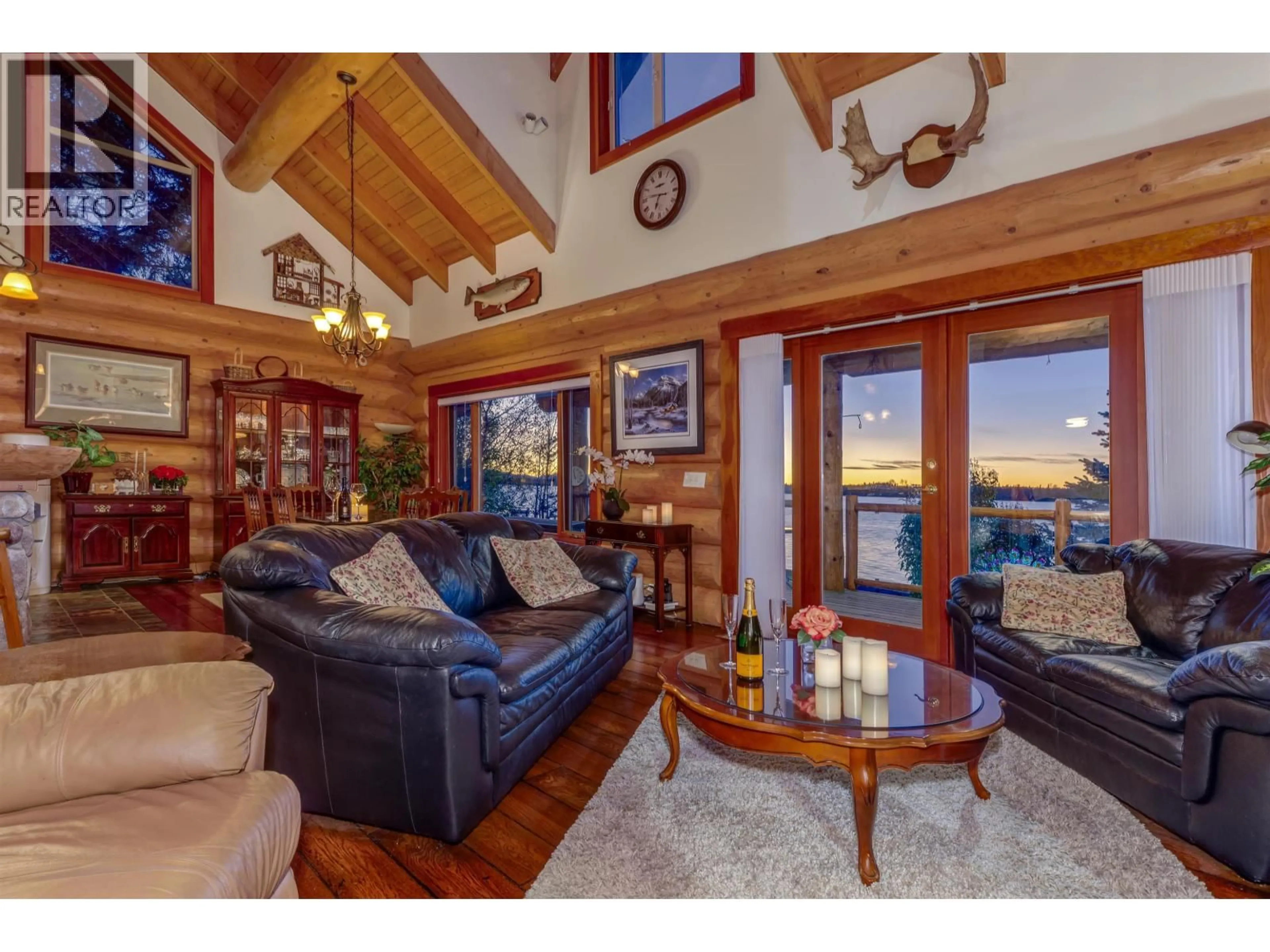 Living room with furniture, wood/laminate floor for 263 GREEN LAKE ROAD SOUTH, 70 Mile House British Columbia V0K2K0