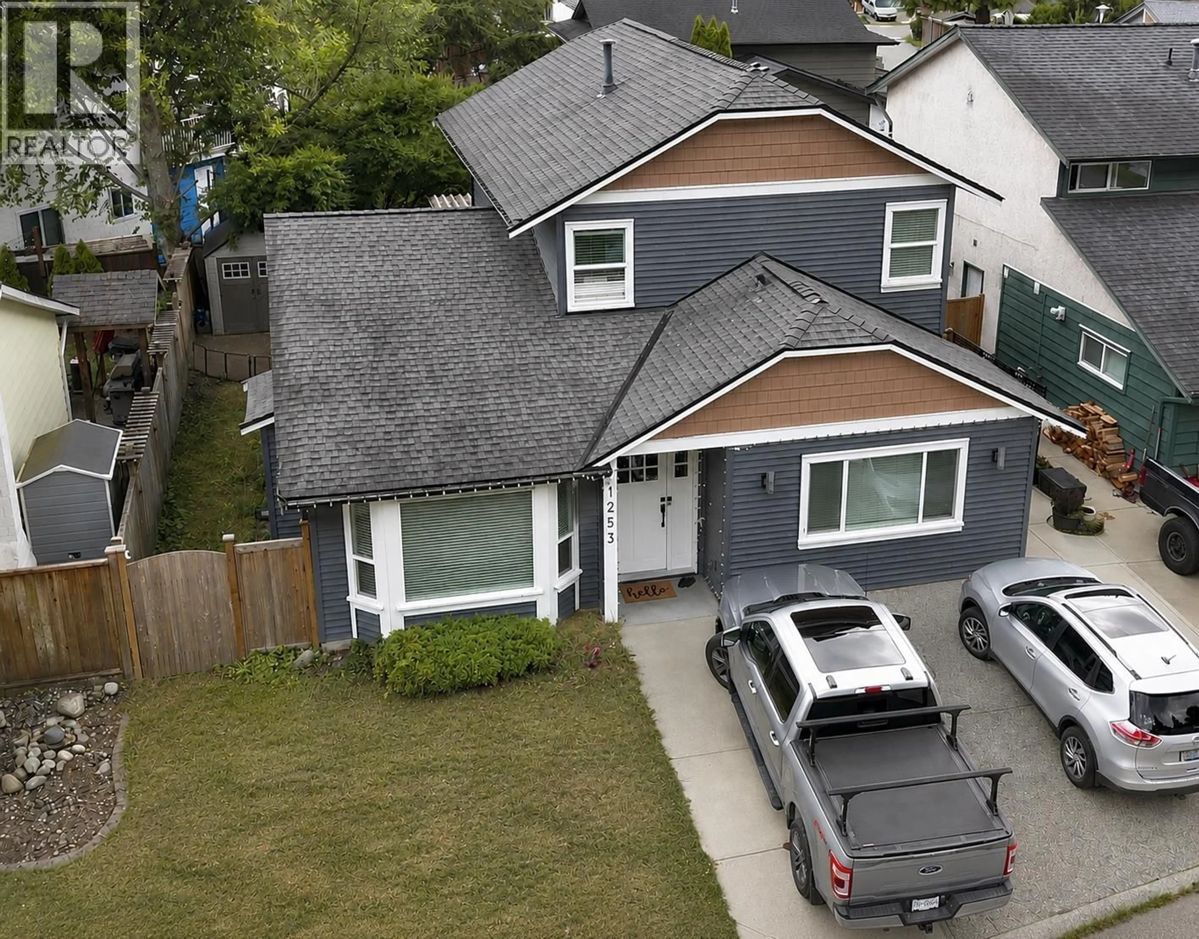 A pic from outside/outdoor area/front of a property/back of a property/a pic from drone, street for 1253 BLUFF DRIVE, Coquitlam British Columbia V3E1L6