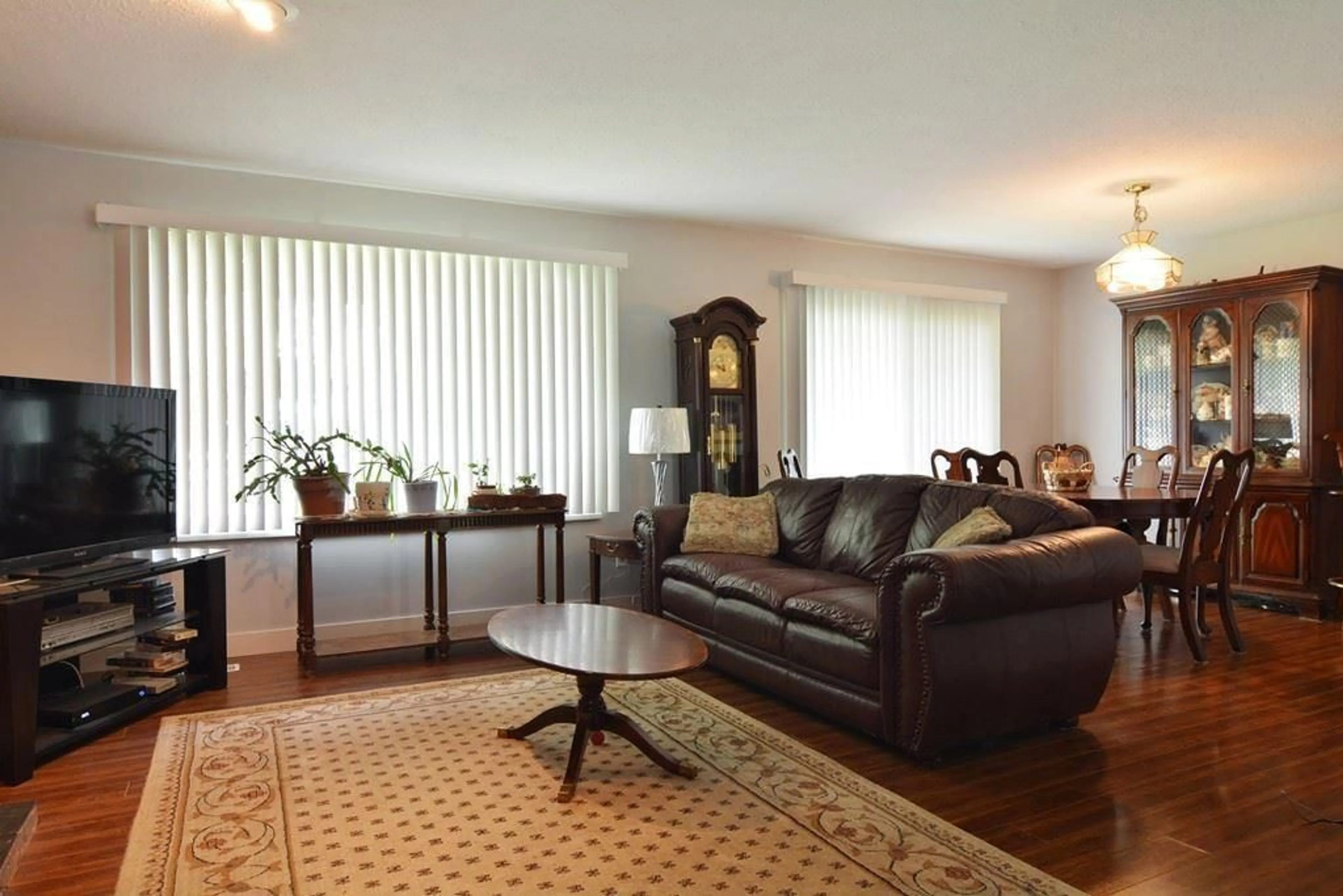 Living room with furniture, wood/laminate floor for 1828 248 STREET, Langley British Columbia V4W2C3