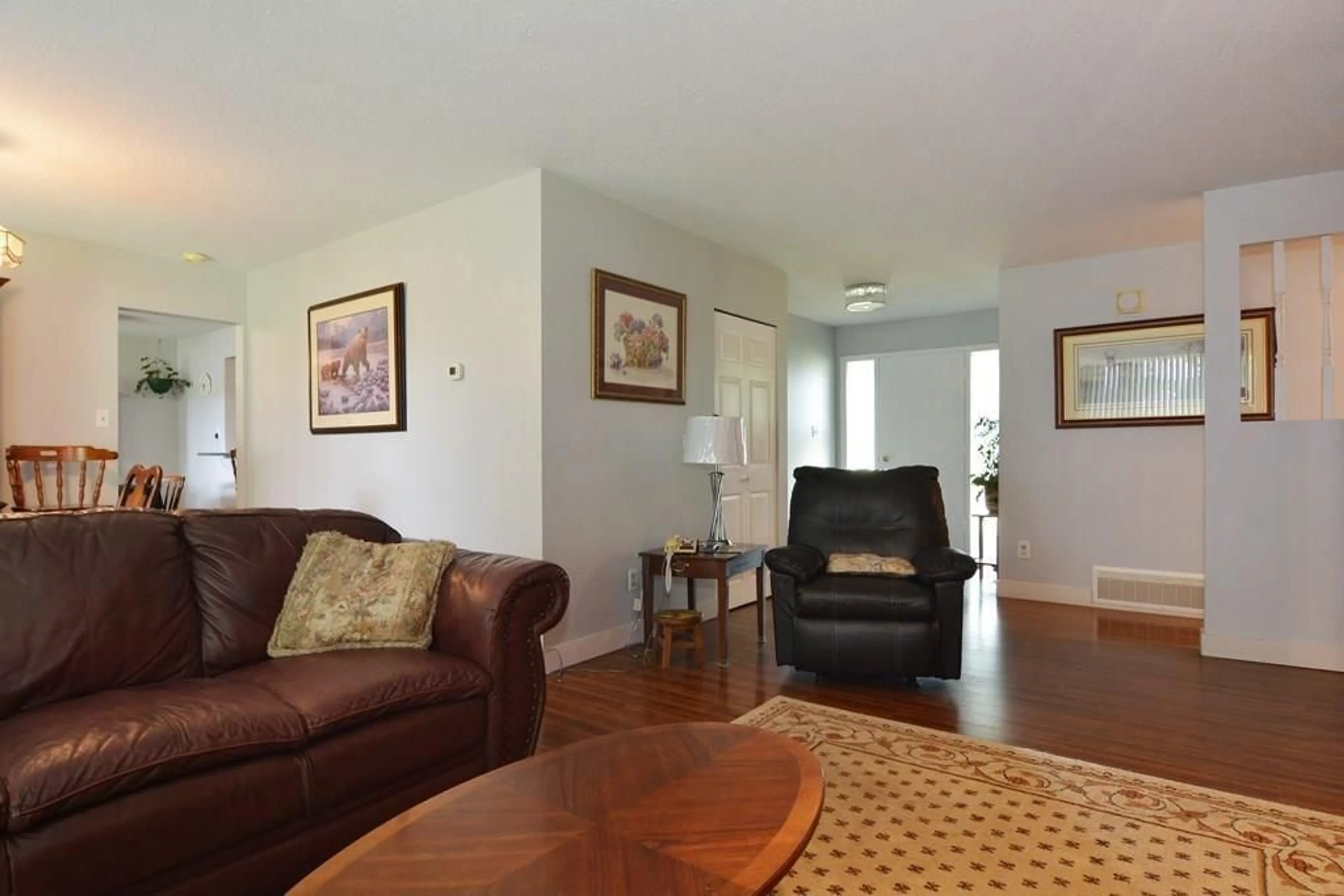 Living room with furniture, wood/laminate floor for 1828 248 STREET, Langley British Columbia V4W2C3