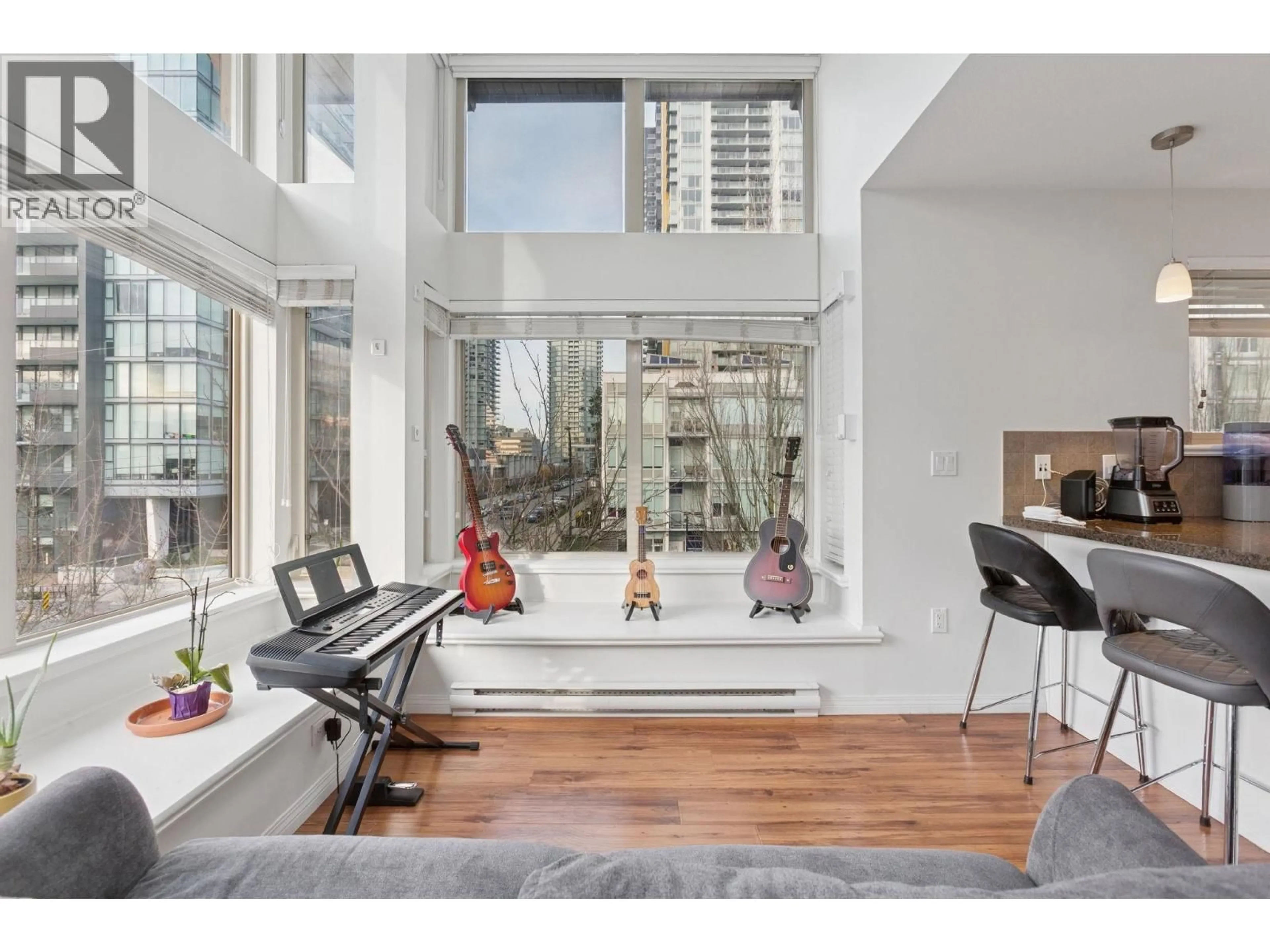 Living room with furniture, wood/laminate floor for 301 - 5000 IMPERIAL STREET, Burnaby British Columbia V5J1C8