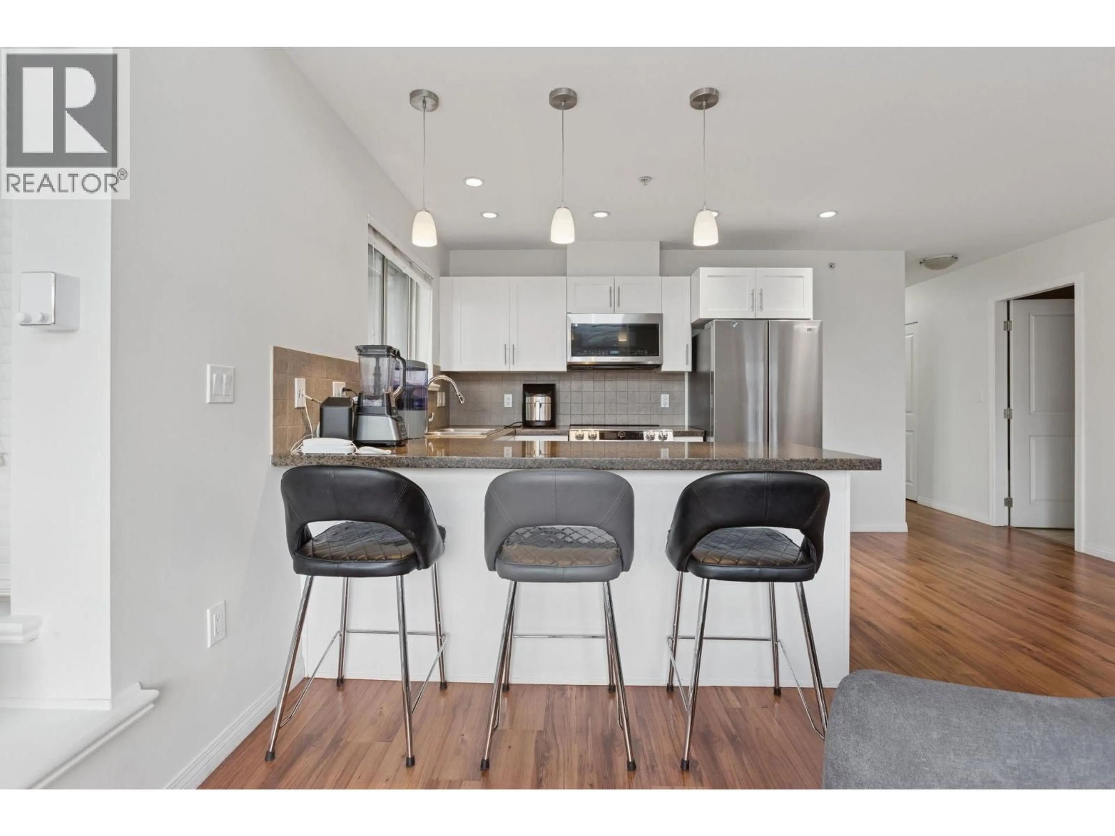 Open concept kitchen, wood/laminate floor for 301 - 5000 IMPERIAL STREET, Burnaby British Columbia V5J1C8