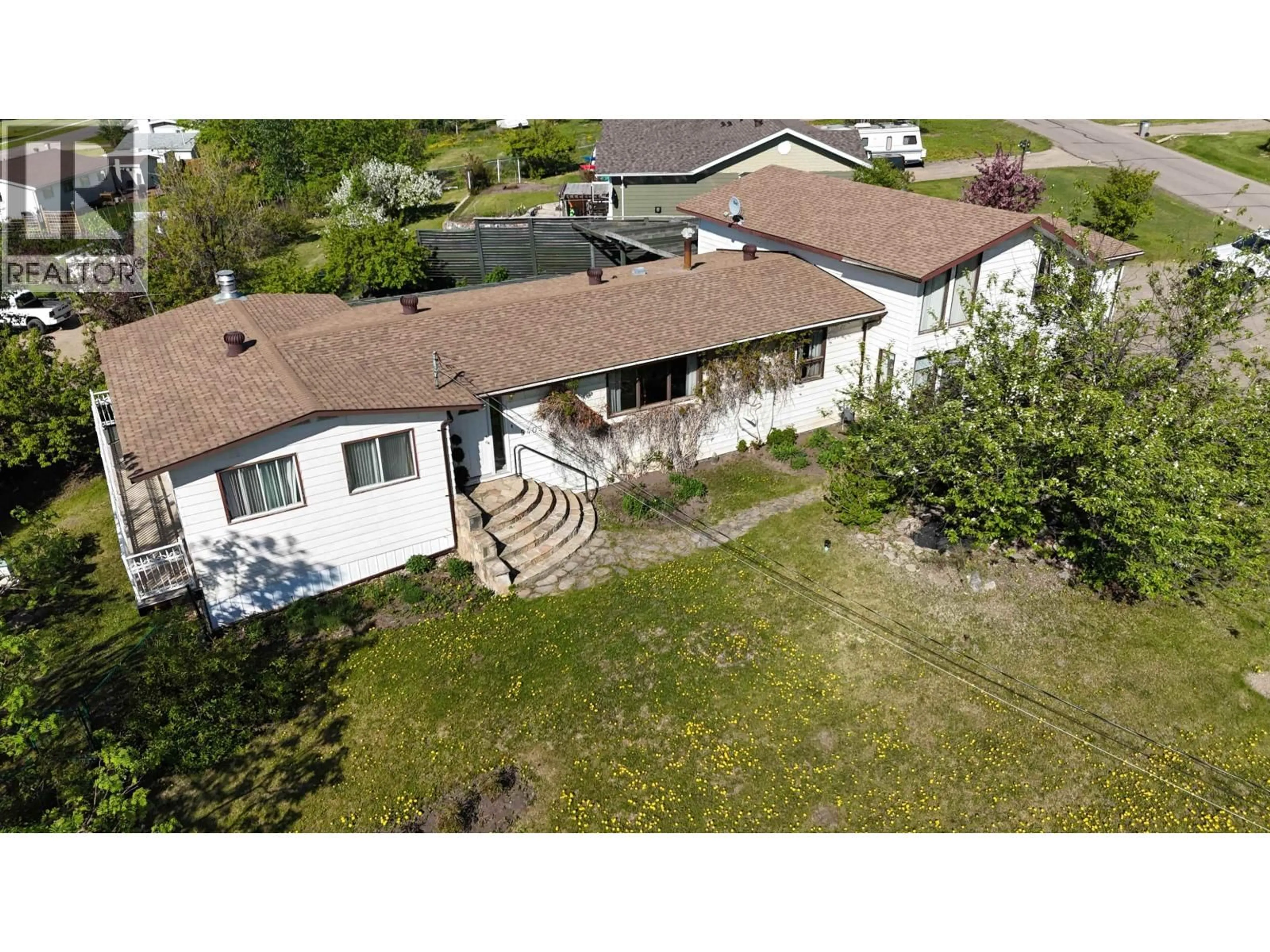 A pic from outside/outdoor area/front of a property/back of a property/a pic from drone, building for 5403 LIARD STREET, Fort Nelson British Columbia V0C1R0