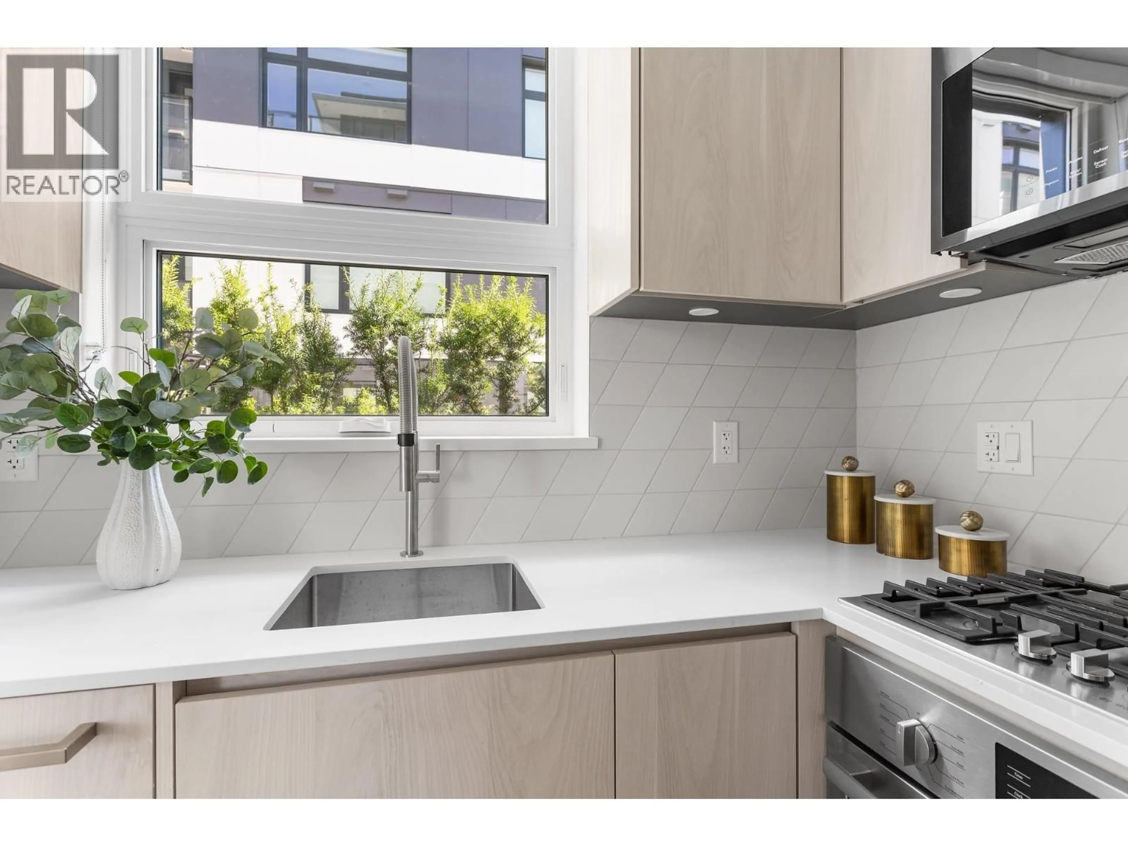 Contemporary kitchen, ceramic/tile floor for 3249 CLIVE AVENUE, Vancouver British Columbia V5R4V3