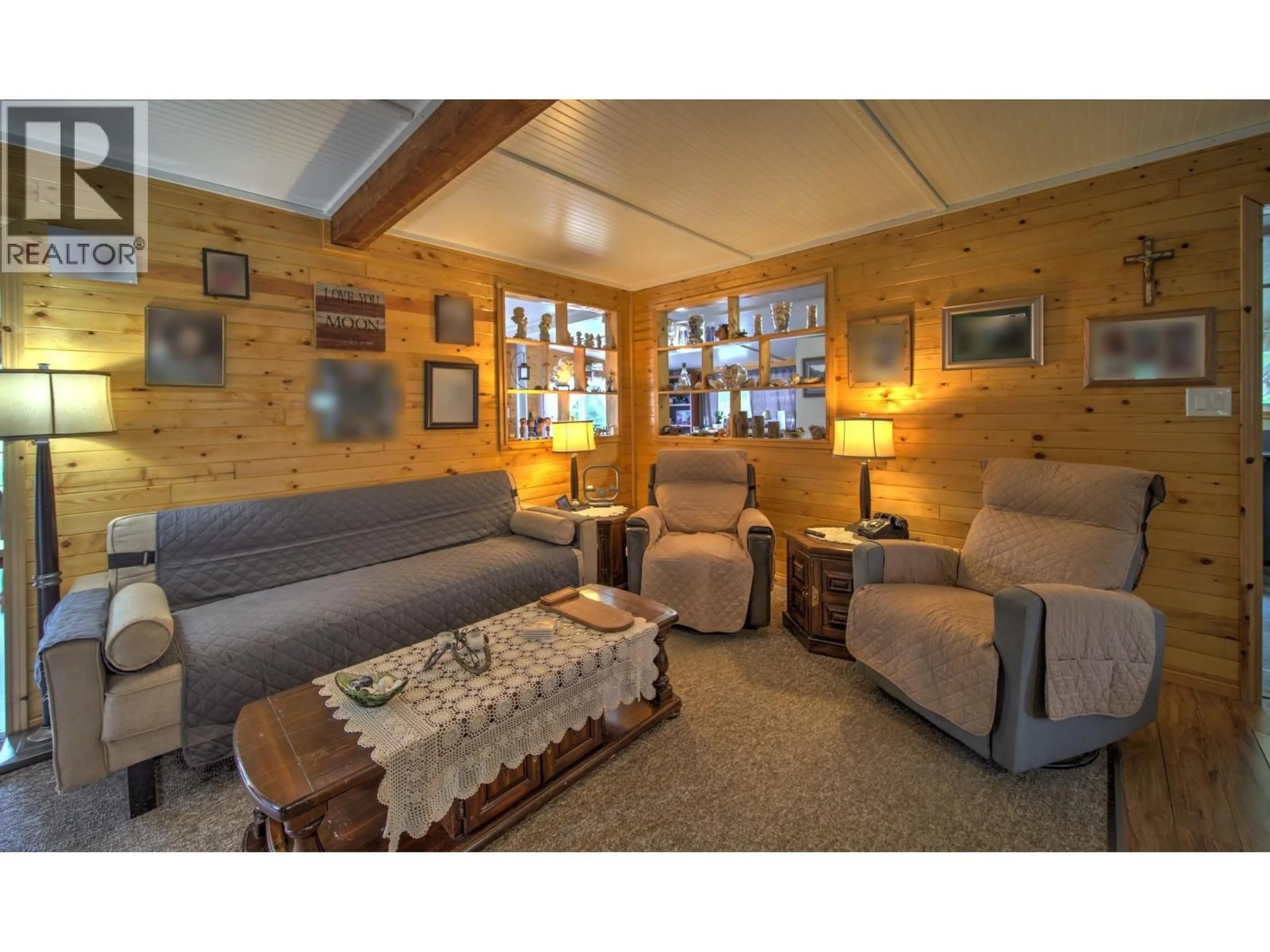 Living room with furniture, wood/laminate floor for 4960 COPPERHEAD ROAD, Likely British Columbia V0L1N0
