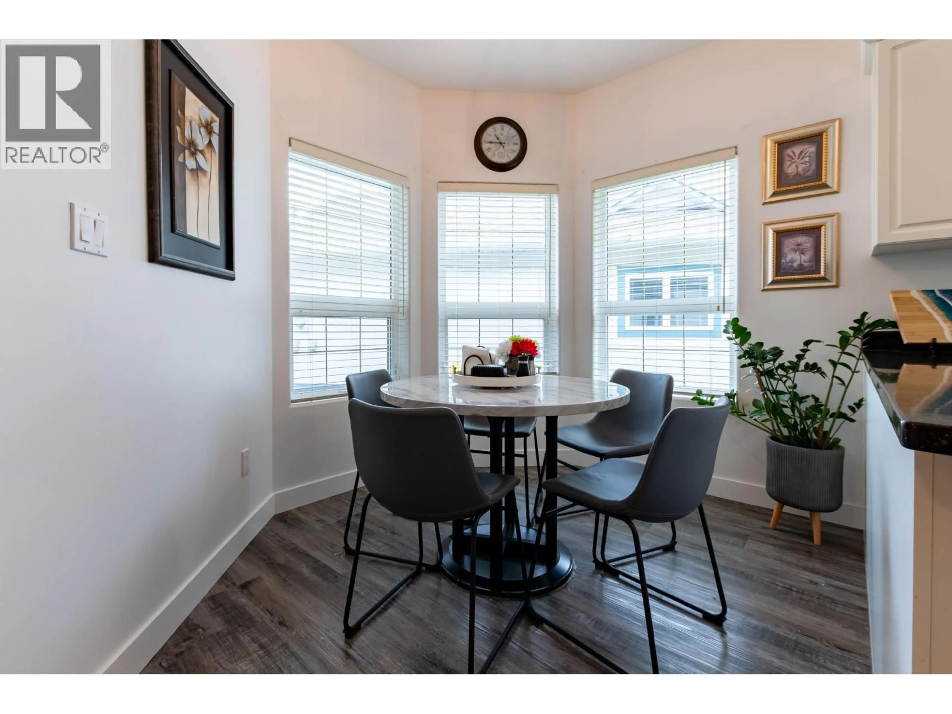 Dining room, wood/laminate floor for 117 - 4450 COWART ROAD, Prince George British Columbia V2N4Z5