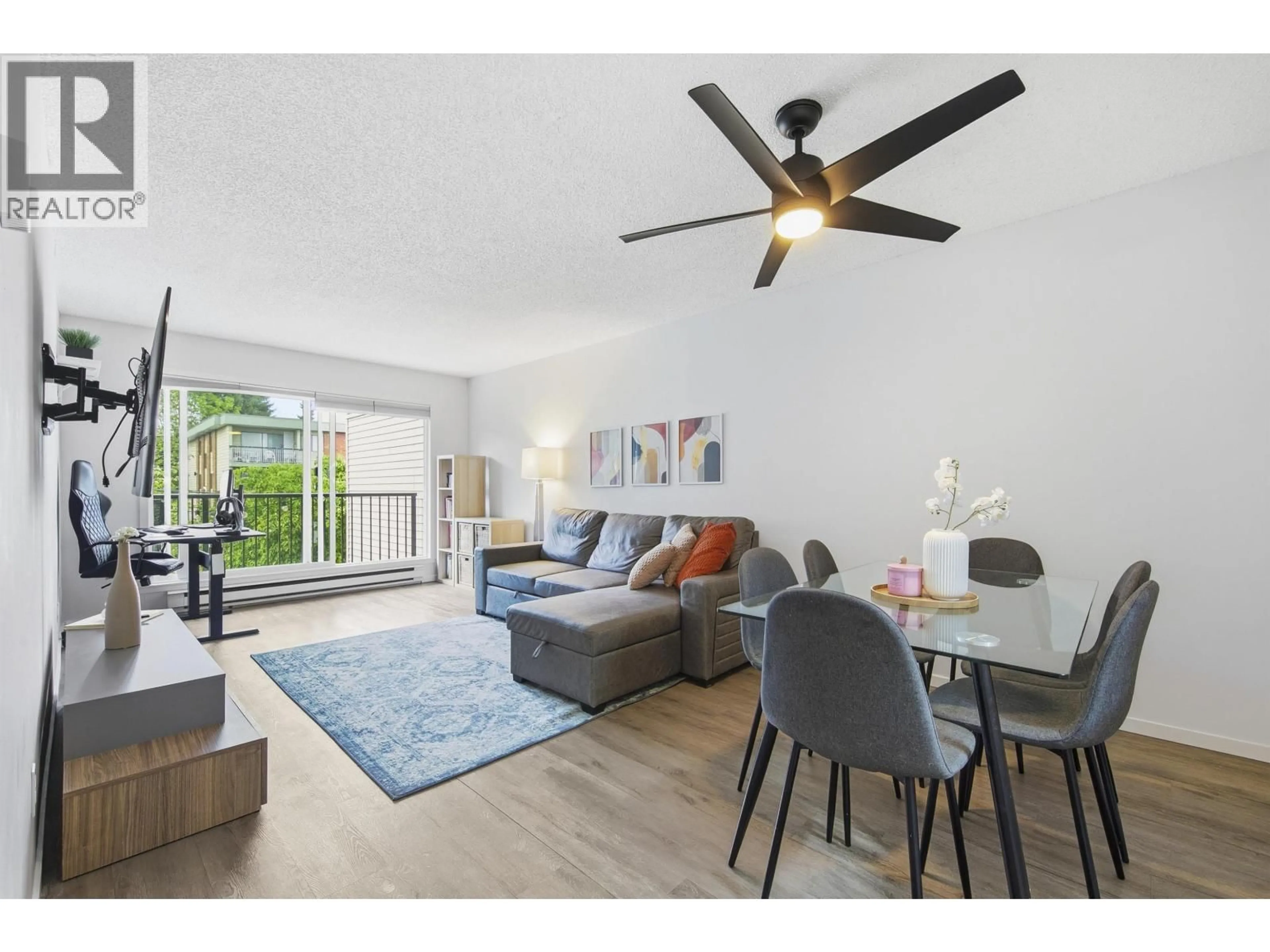 Living room with furniture, wood/laminate floor for 305 - 1050 HOWIE AVENUE, Coquitlam British Columbia V3J1T6