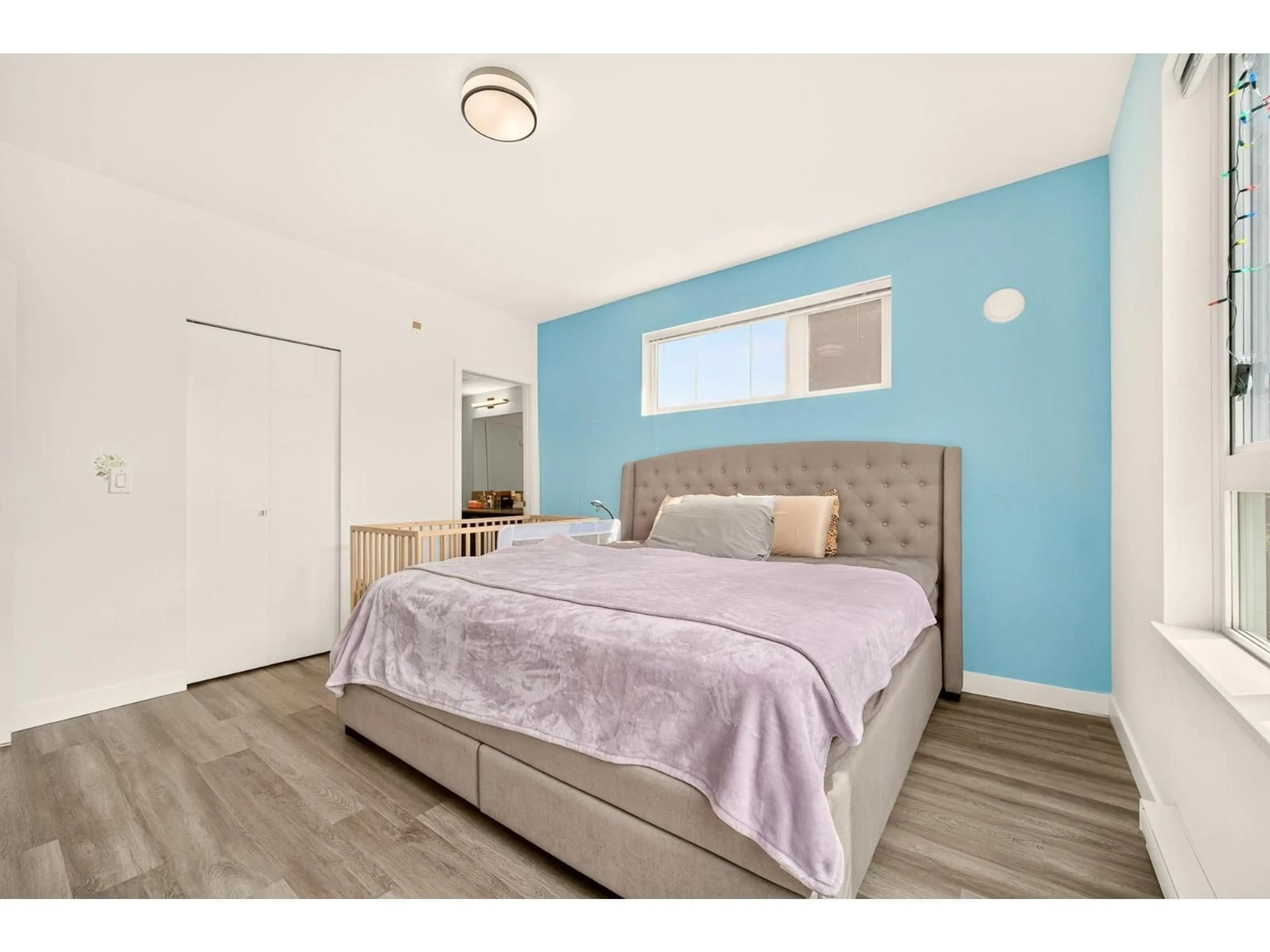 Bedroom with bed, wood/laminate floor for 312 - 10603 140 STREET, Surrey British Columbia V3T0M8