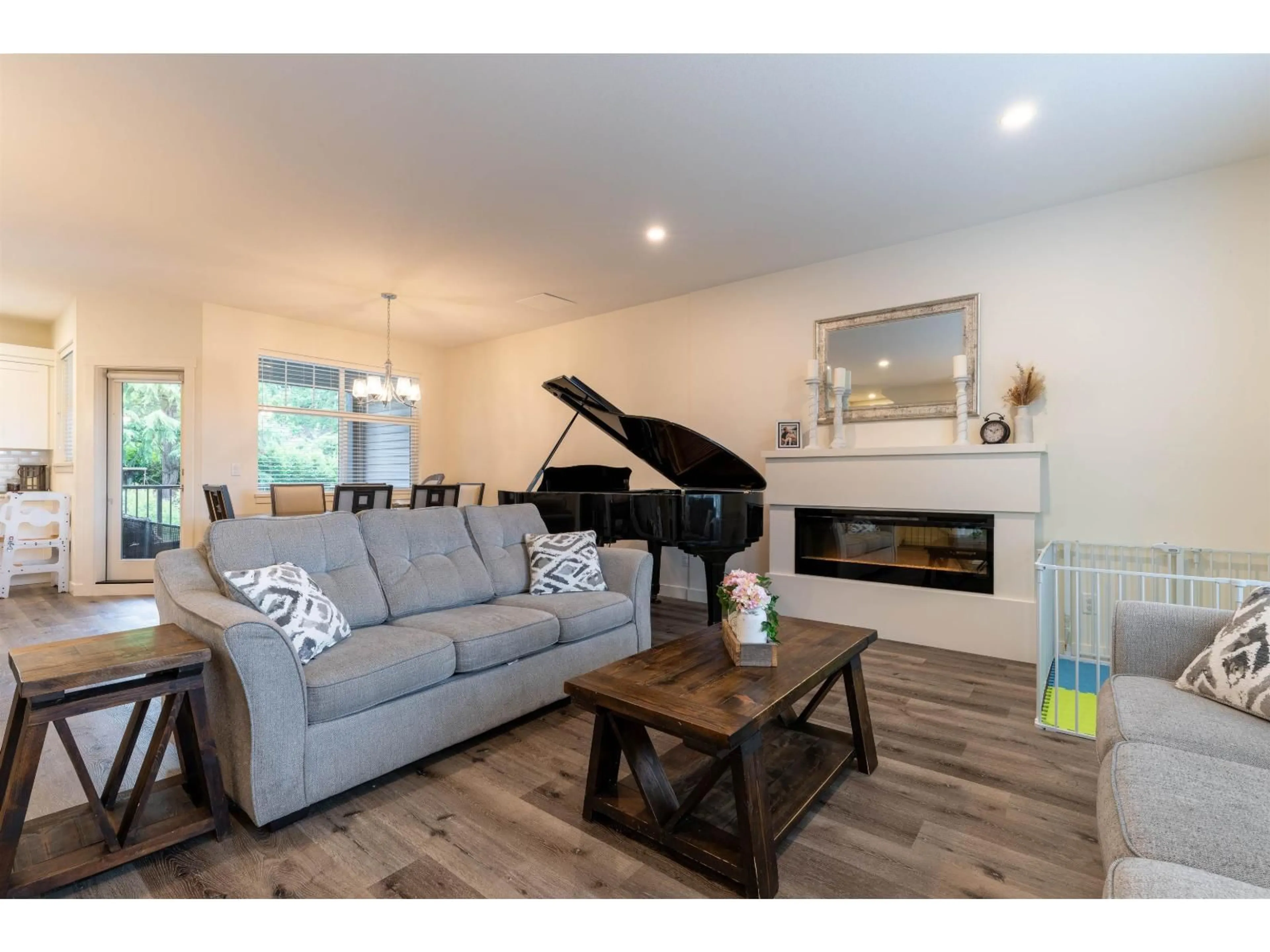 Living room with furniture, wood/laminate floor for 2 - 7740 GRAND STREET, Mission British Columbia V2V3T3
