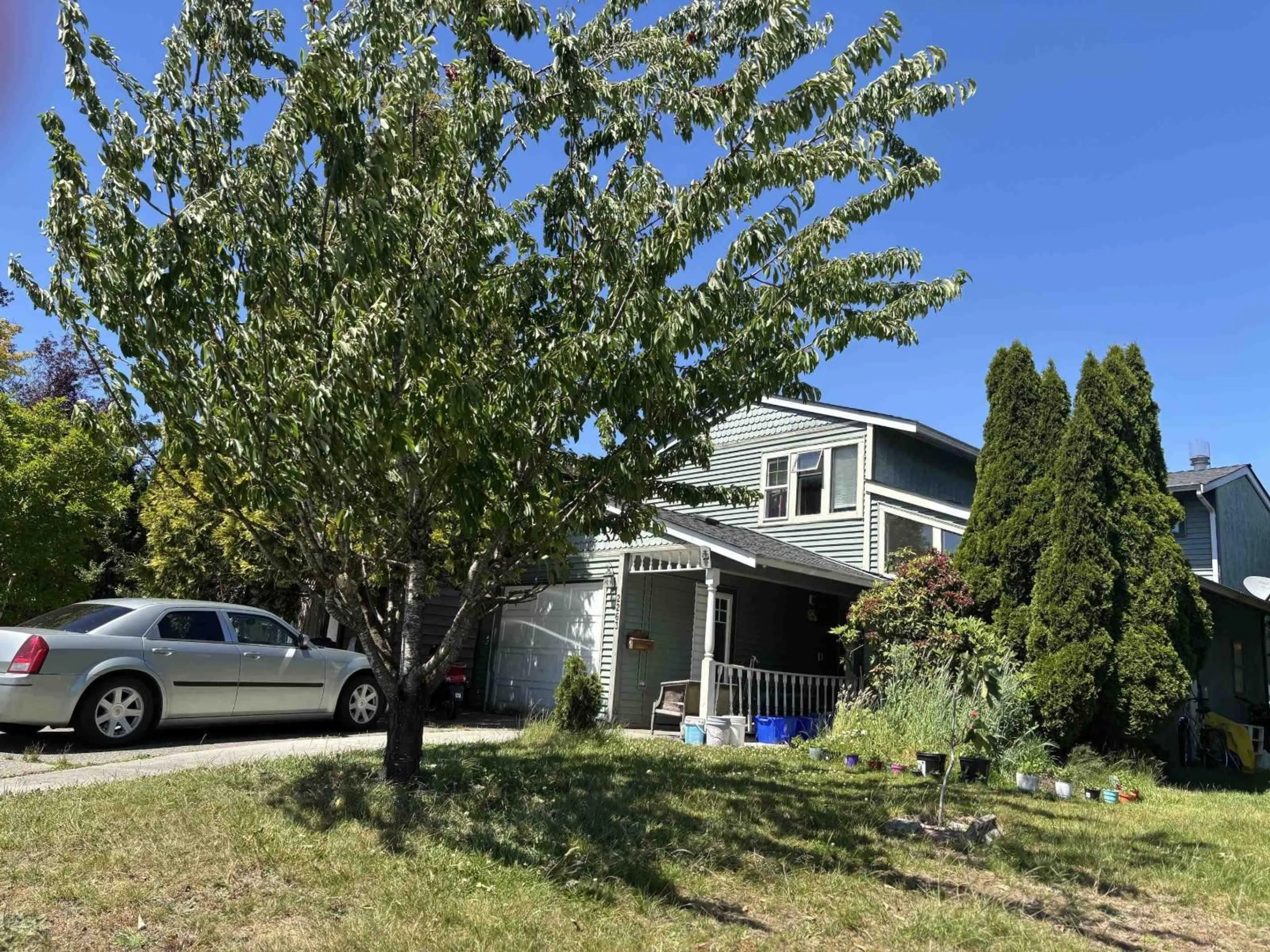 Home with vinyl exterior material, street for 2263 WILLOUGHBY WAY, Langley British Columbia V2Y1B9