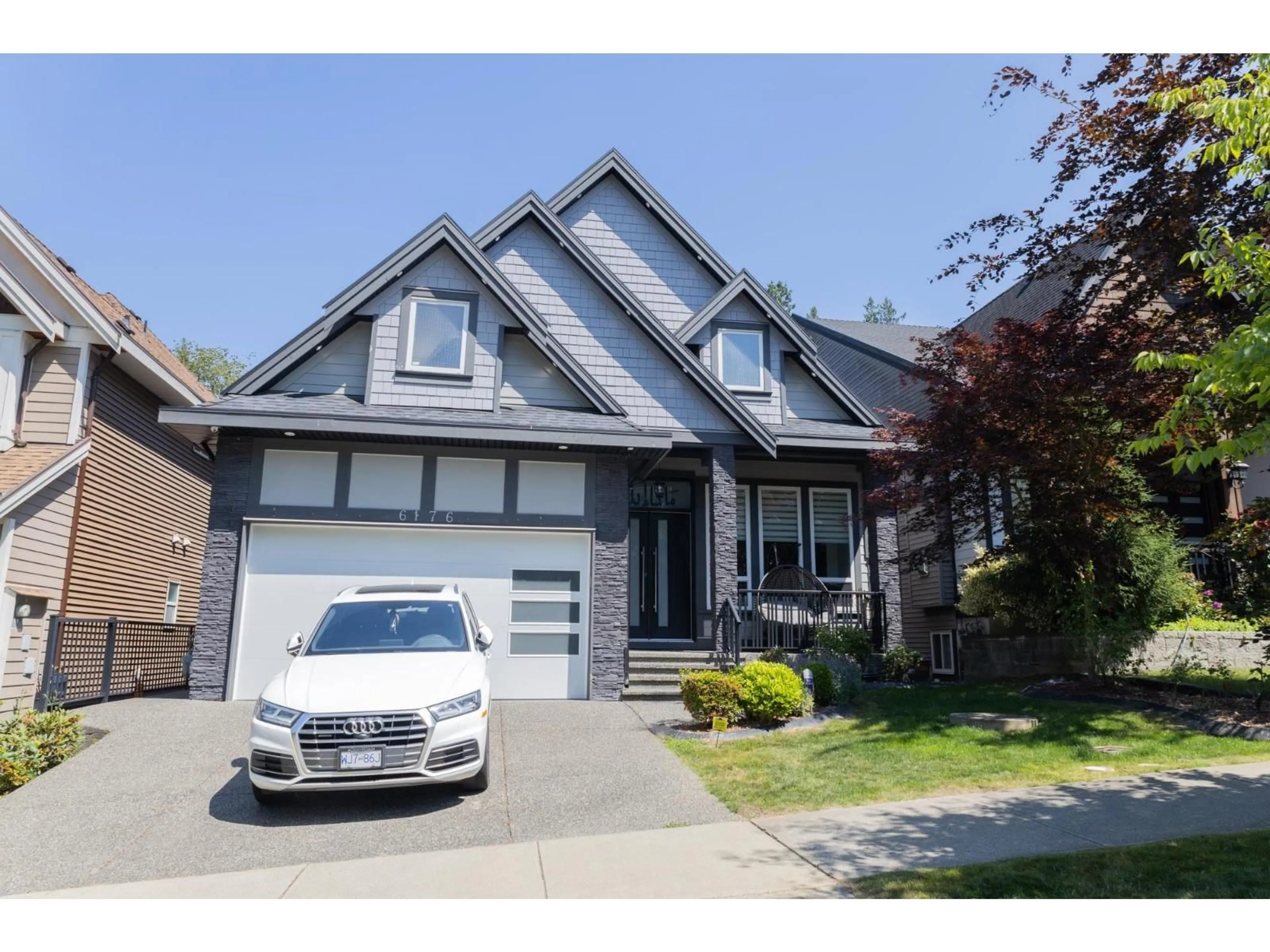 Home with vinyl exterior material, street for 6176 140 STREET, Surrey British Columbia V3X1C9