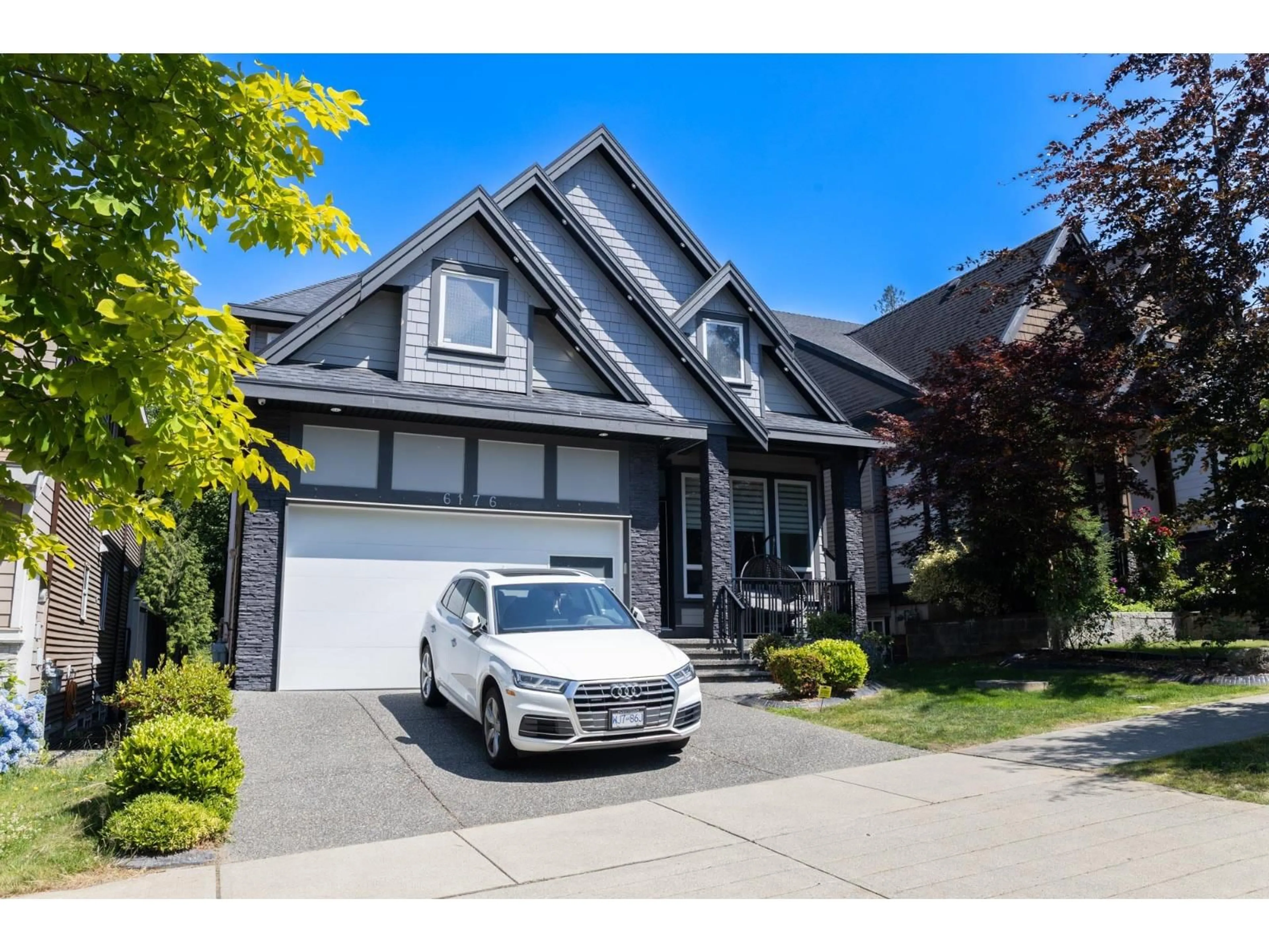 Home with vinyl exterior material, street for 6176 140 STREET, Surrey British Columbia V3X1C9