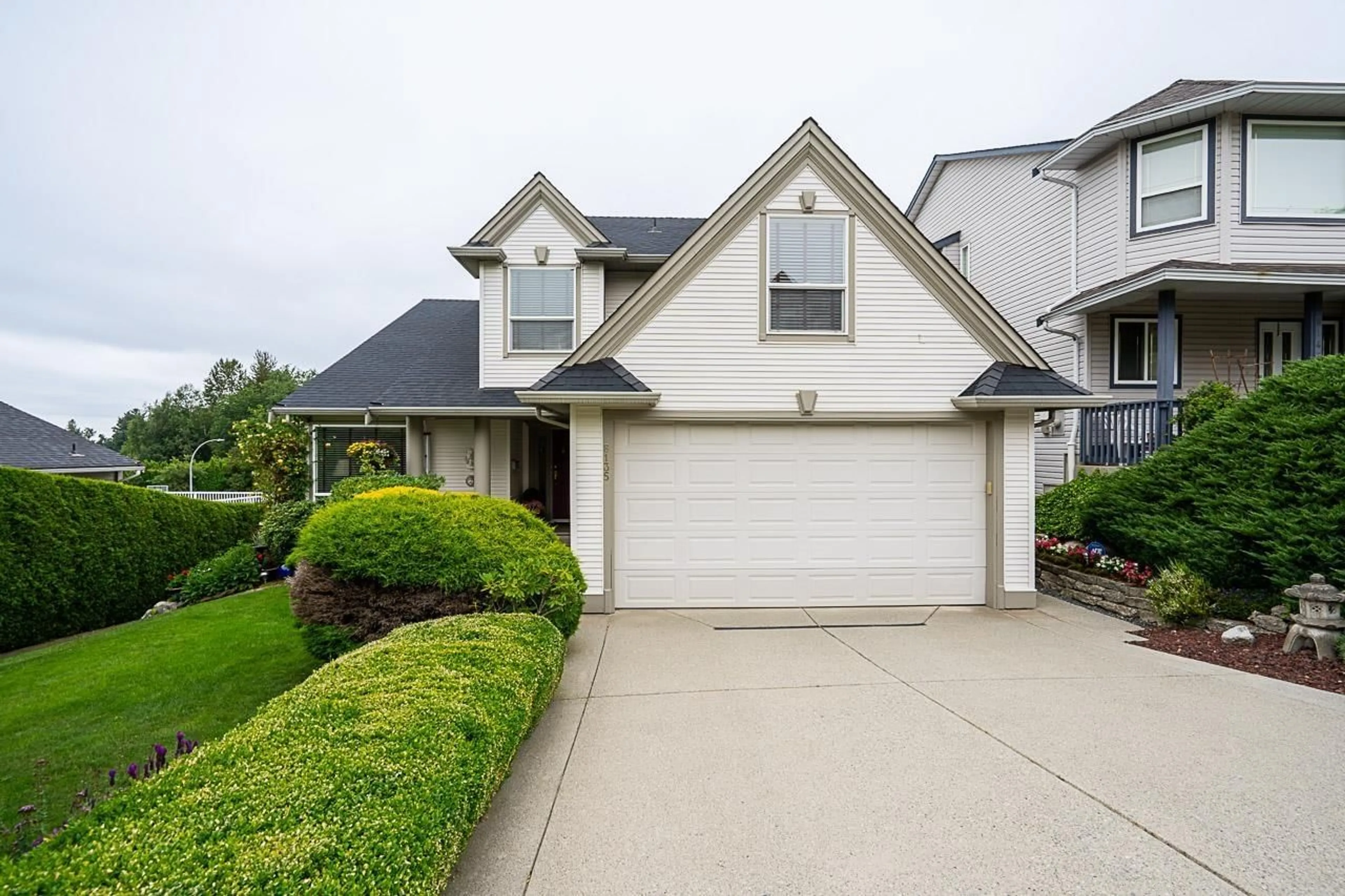Home with vinyl exterior material, street for 8135 BARNETT STREET, Mission British Columbia V3A4X4