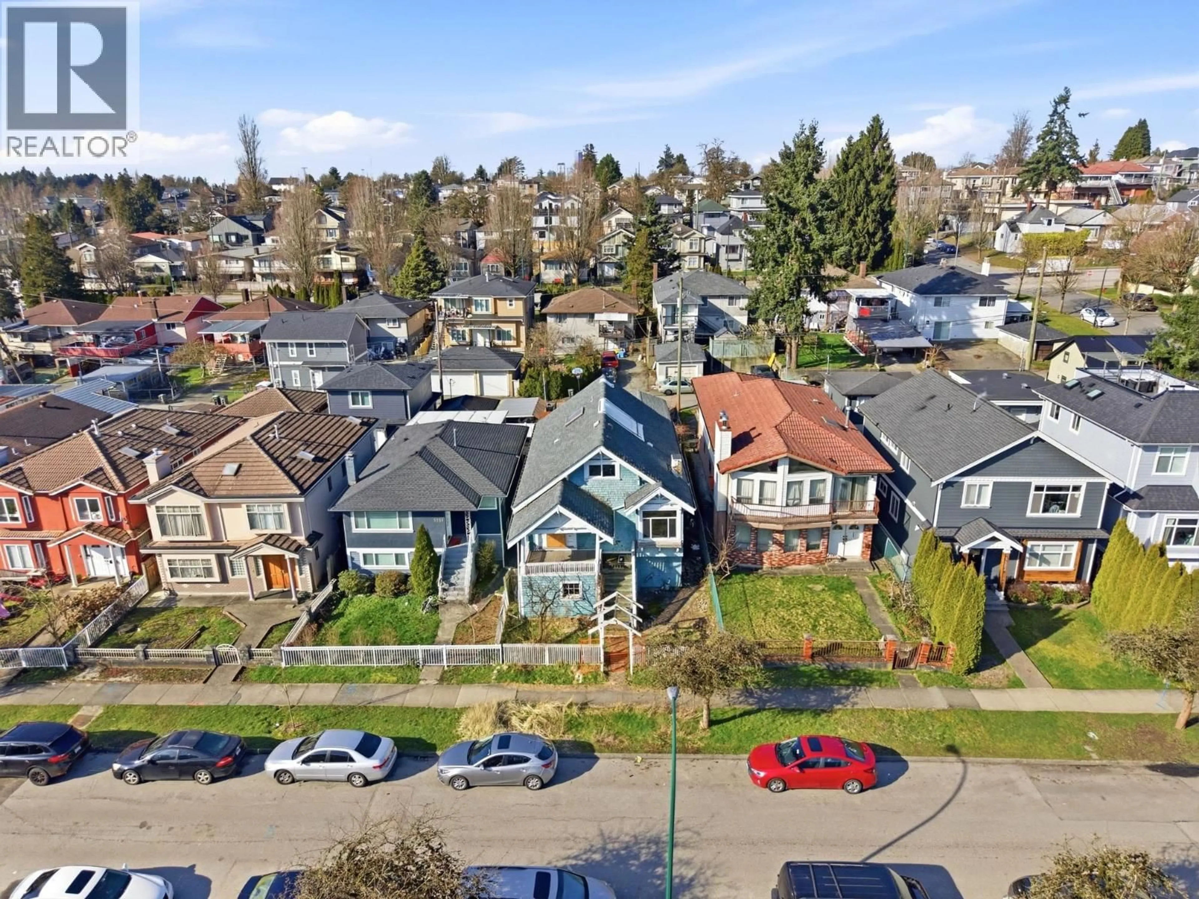 A pic from outside/outdoor area/front of a property/back of a property/a pic from drone, street for 5541 LANARK STREET, Vancouver British Columbia V5P2Y2