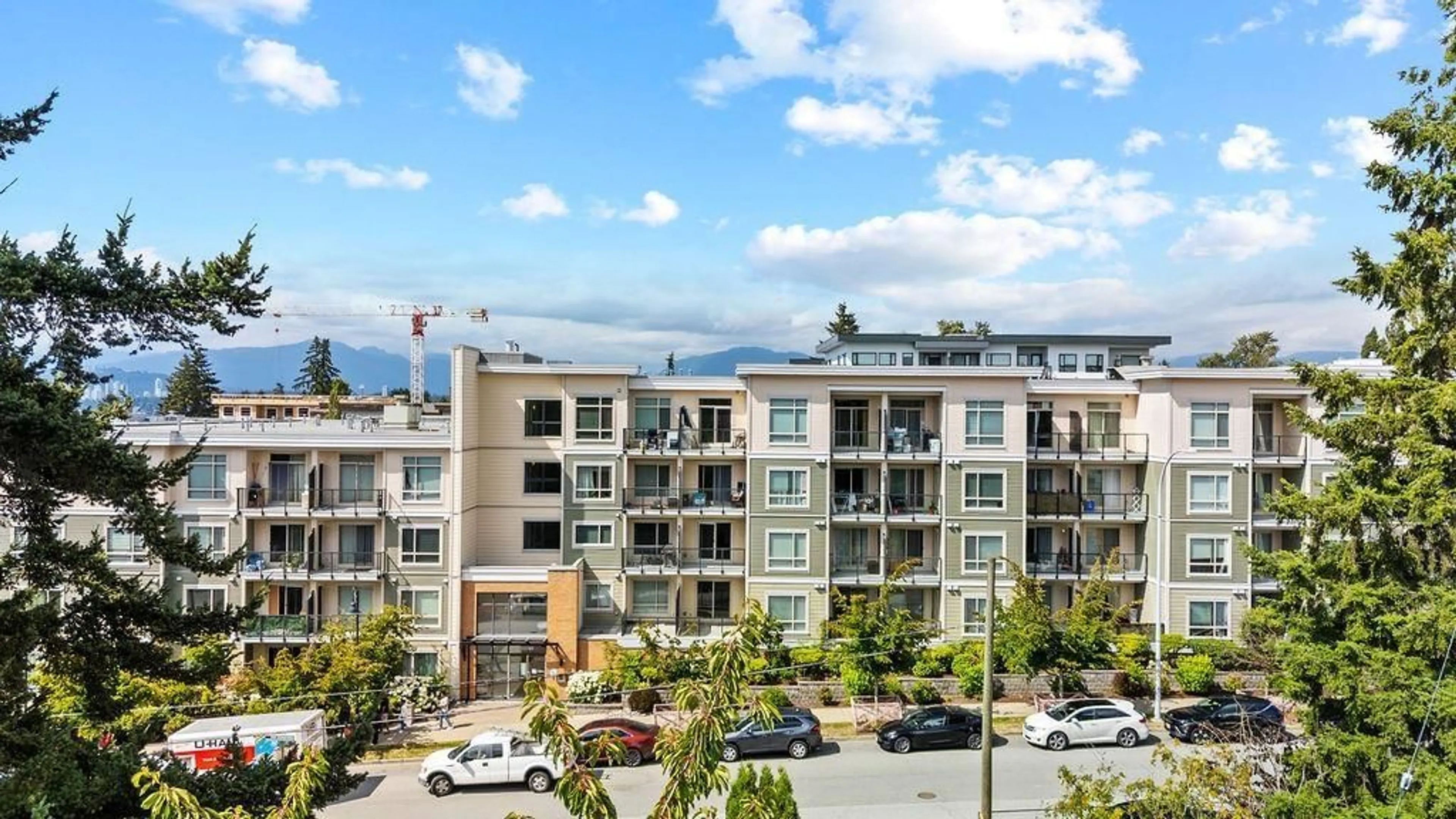 A pic from outside/outdoor area/front of a property/back of a property/a pic from drone, mountain view for 328 - 13789 107A AVENUE, Surrey British Columbia V3T0B8