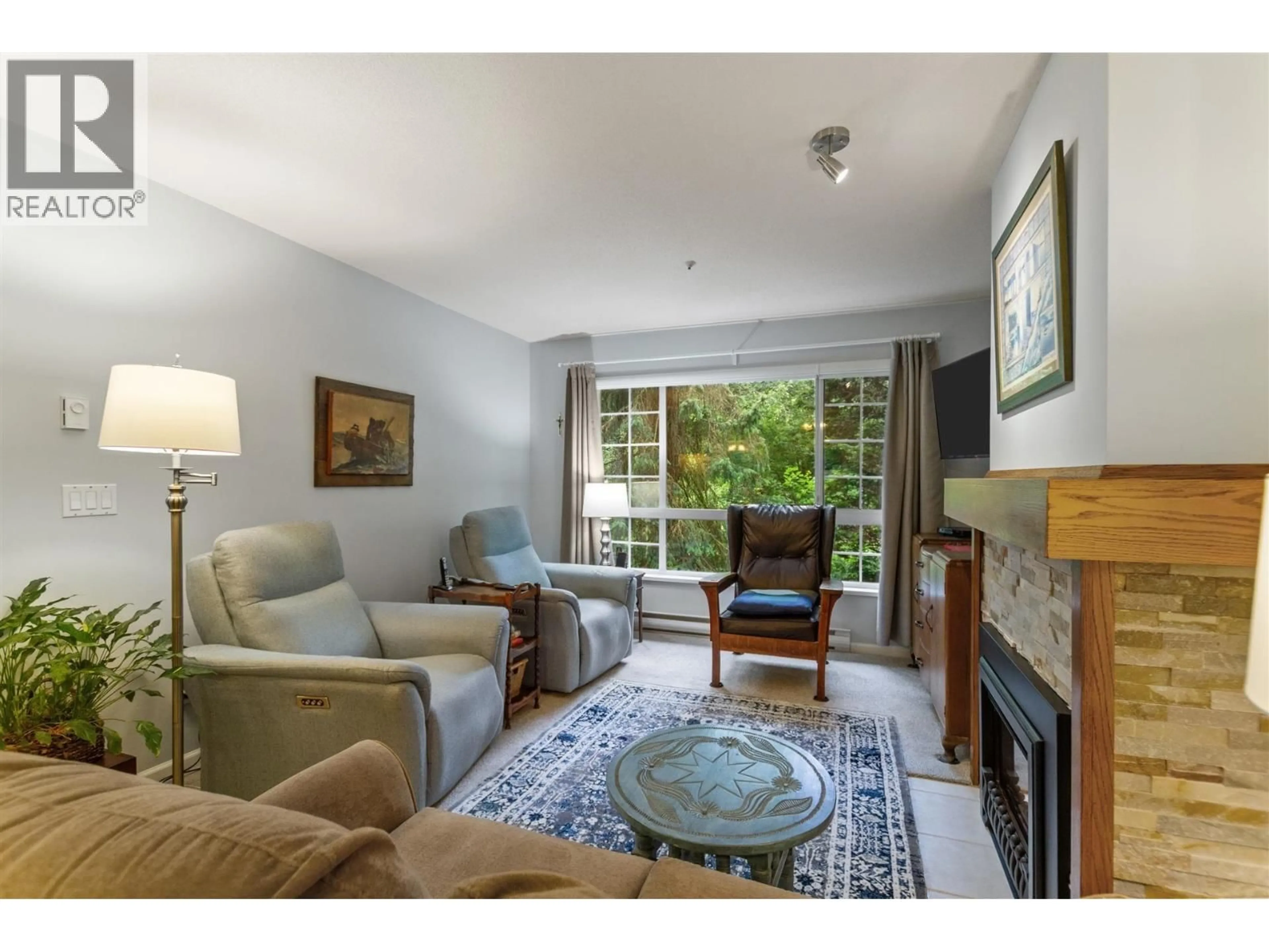 Living room with furniture, unknown for 204 - 1242 TOWN CENTRE BOULEVARD, Coquitlam British Columbia V3B7R6