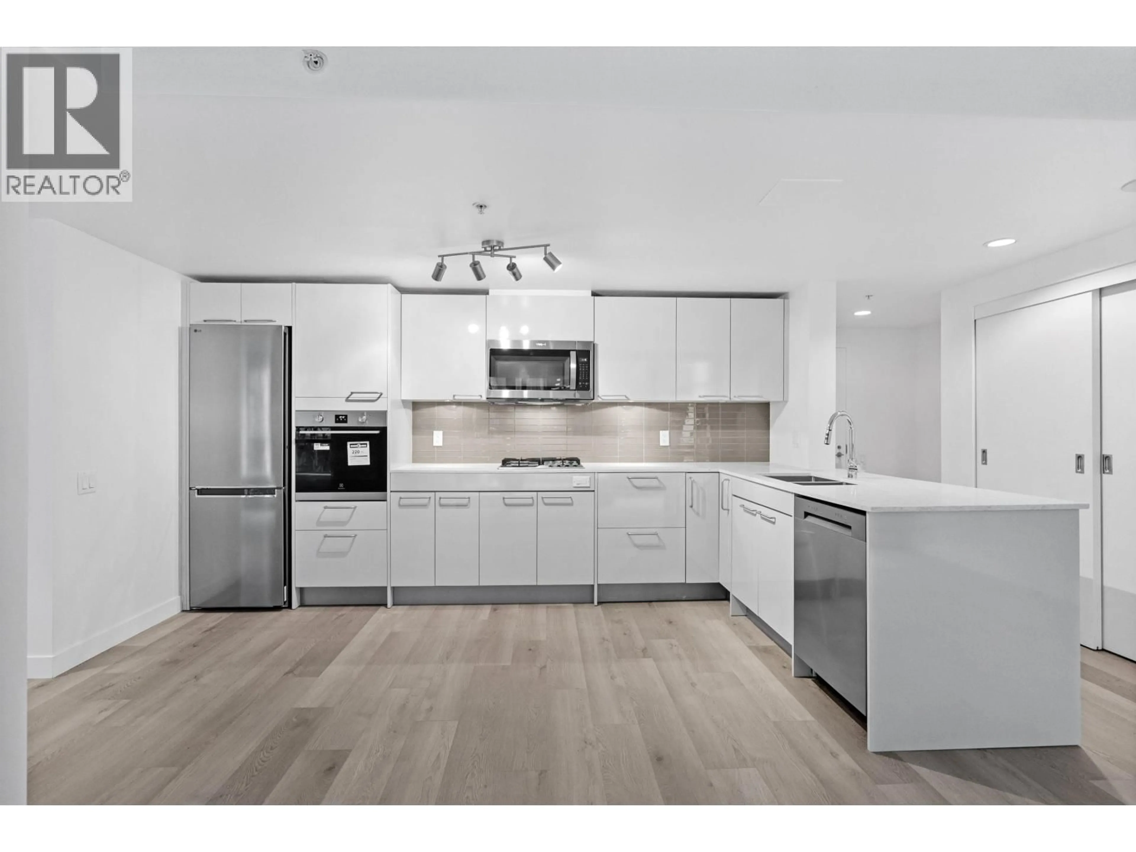 Open concept kitchen, unknown for 202 - 128 CORDOVA STREET, Vancouver British Columbia V6B0E6
