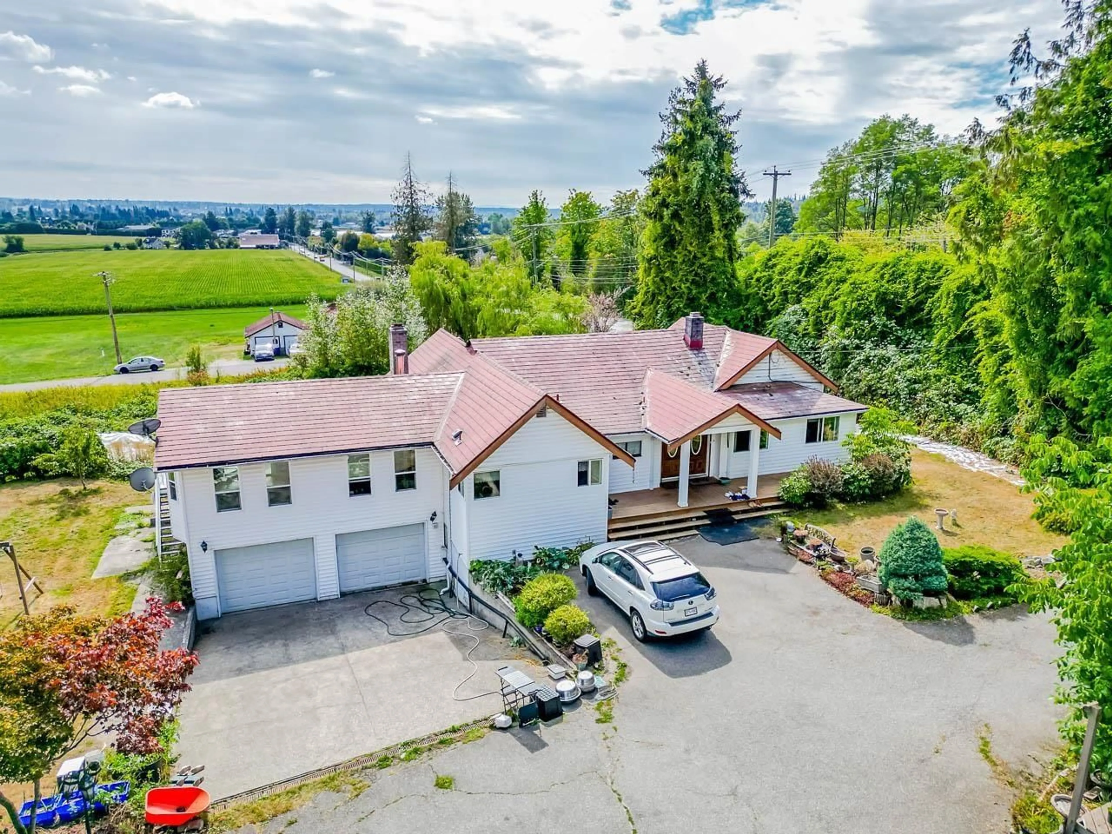 A pic from outside/outdoor area/front of a property/back of a property/a pic from drone, mountain view for 7714 216 STREET, Langley British Columbia V2Y2S5