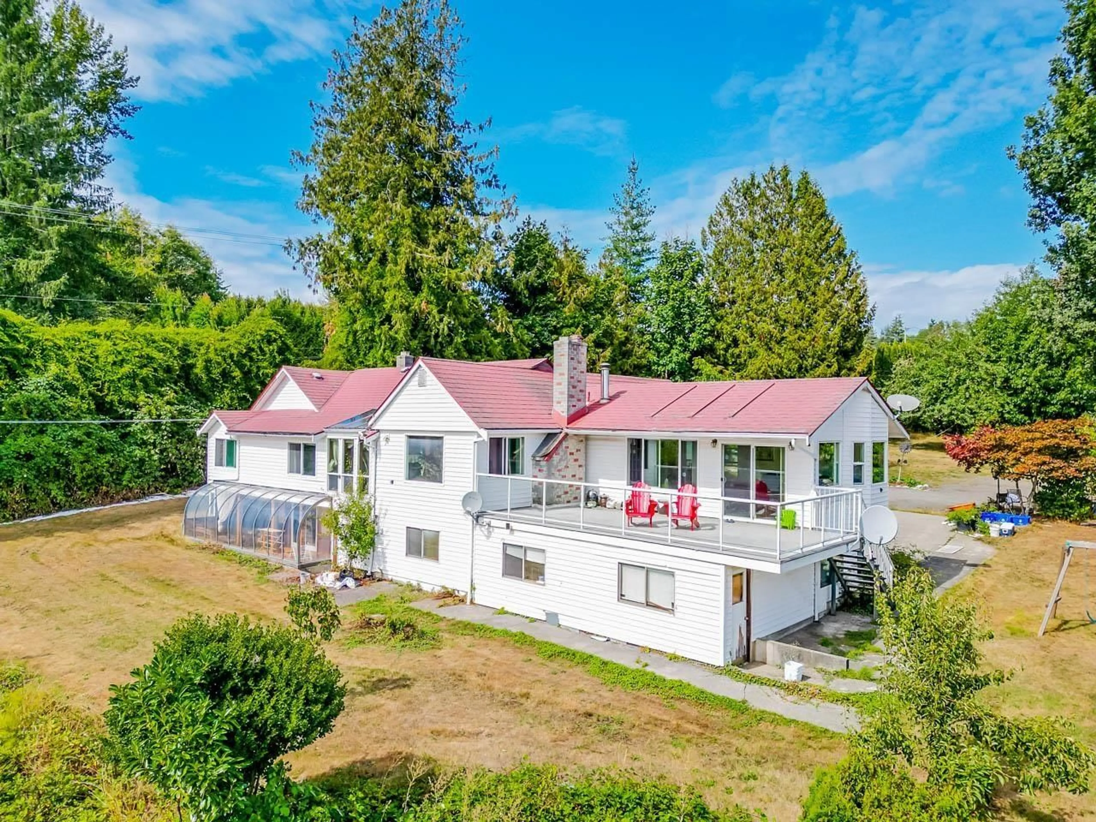 A pic from outside/outdoor area/front of a property/back of a property/a pic from drone, unknown for 7714 216 STREET, Langley British Columbia V2Y2S5