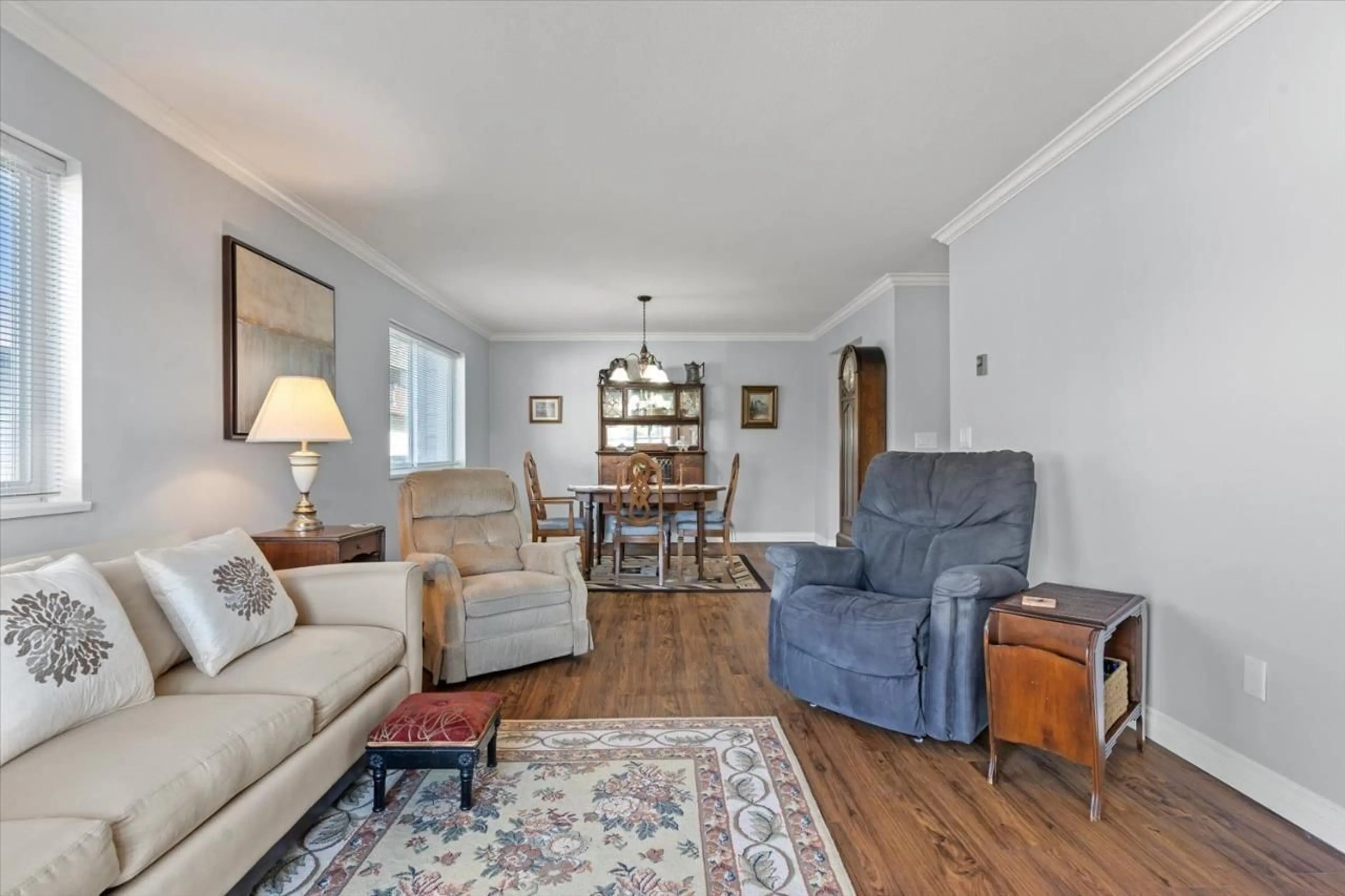 Living room with furniture, wood/laminate floor for 204 - 9175 EDWARD STREET, Chilliwack British Columbia V2P4C5