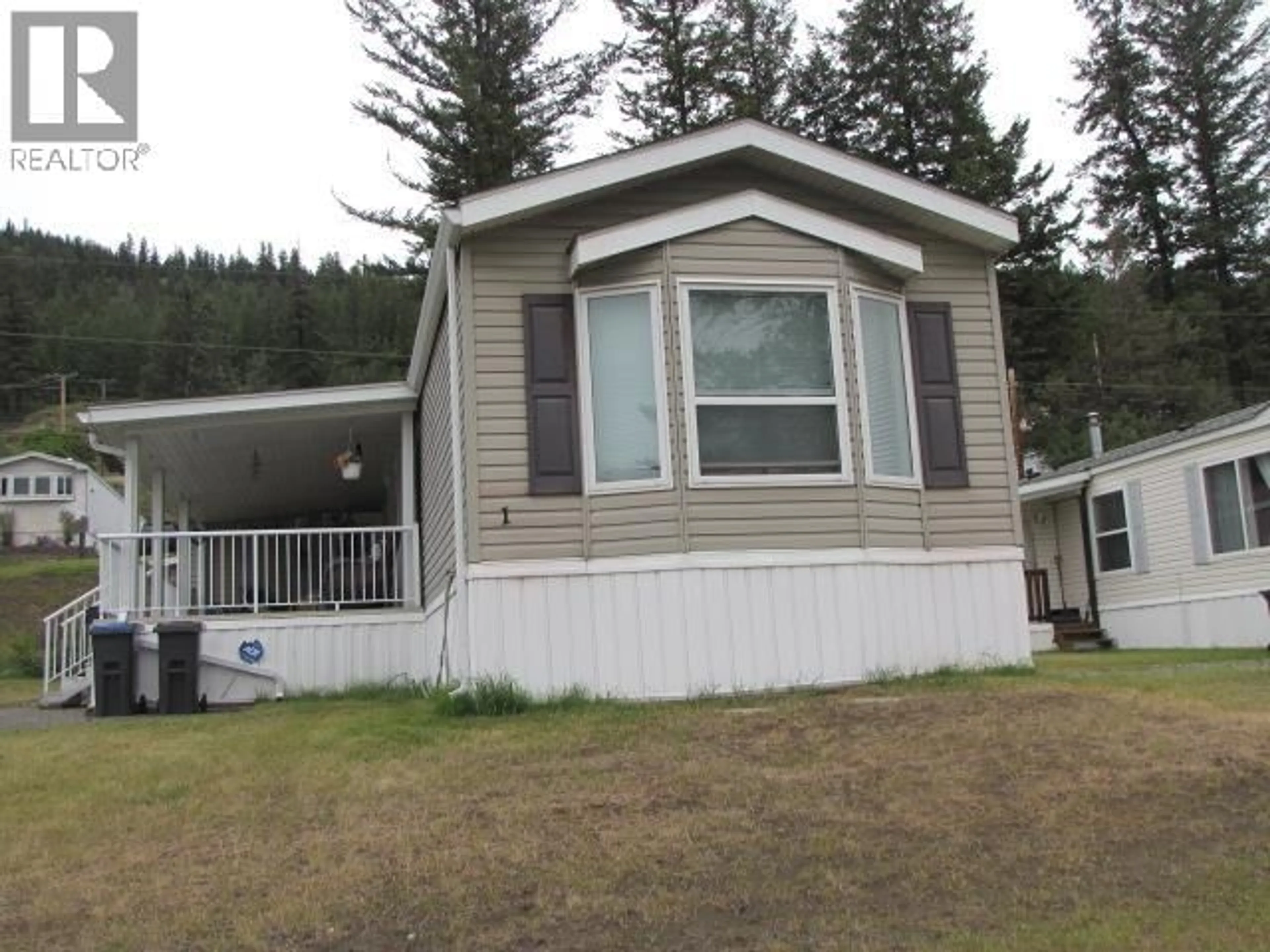 Home with vinyl exterior material, mountain view for 1 - 1700 BROADWAY AVENUE, Williams Lake British Columbia V2G2W5