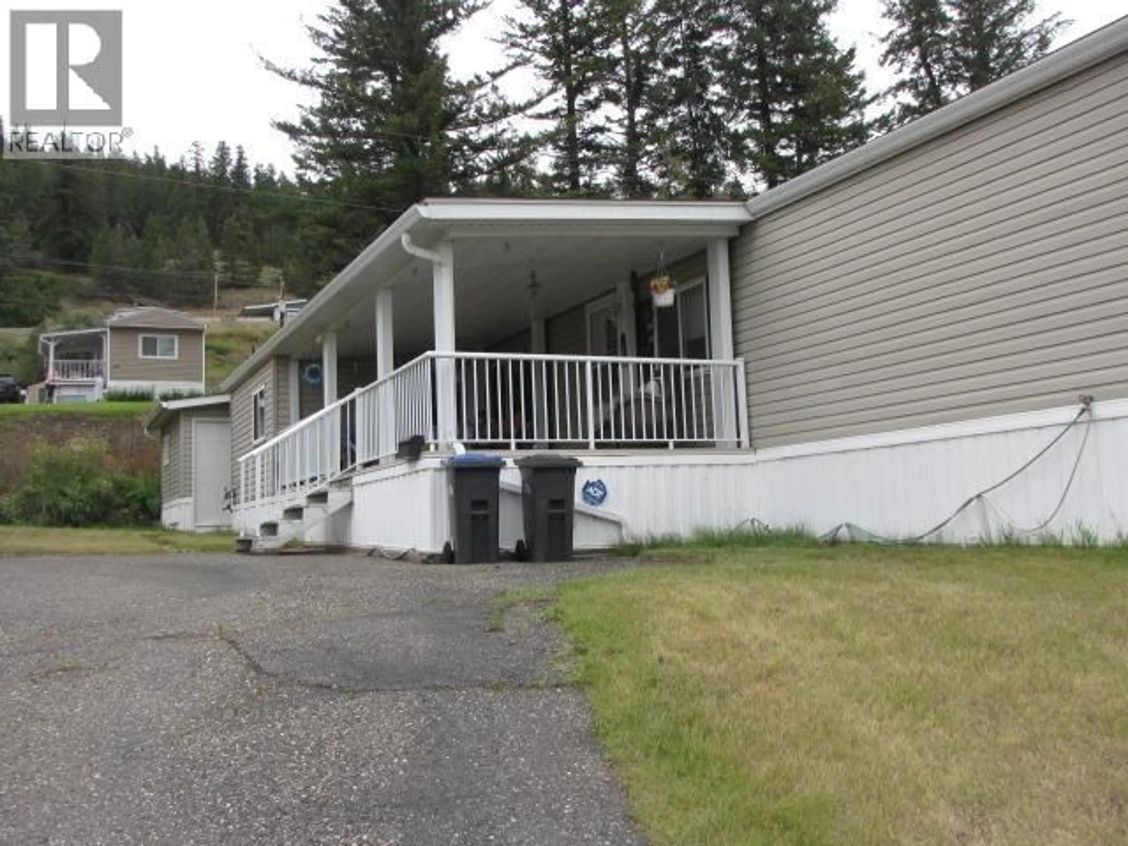 Home with vinyl exterior material, mountain view for 1 - 1700 BROADWAY AVENUE, Williams Lake British Columbia V2G2W5